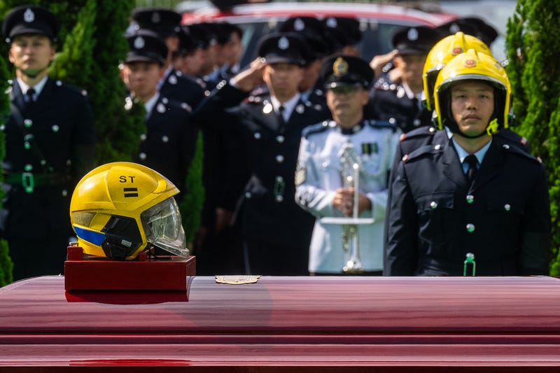 HONG KONG-INCENDIO-BOMBERO-FUNERAL