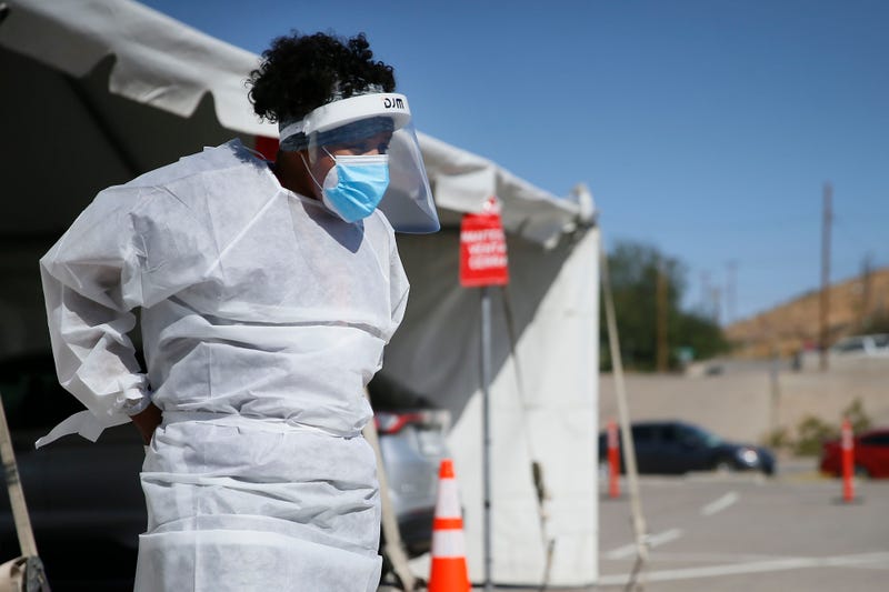 Virus Outbreak US Surge