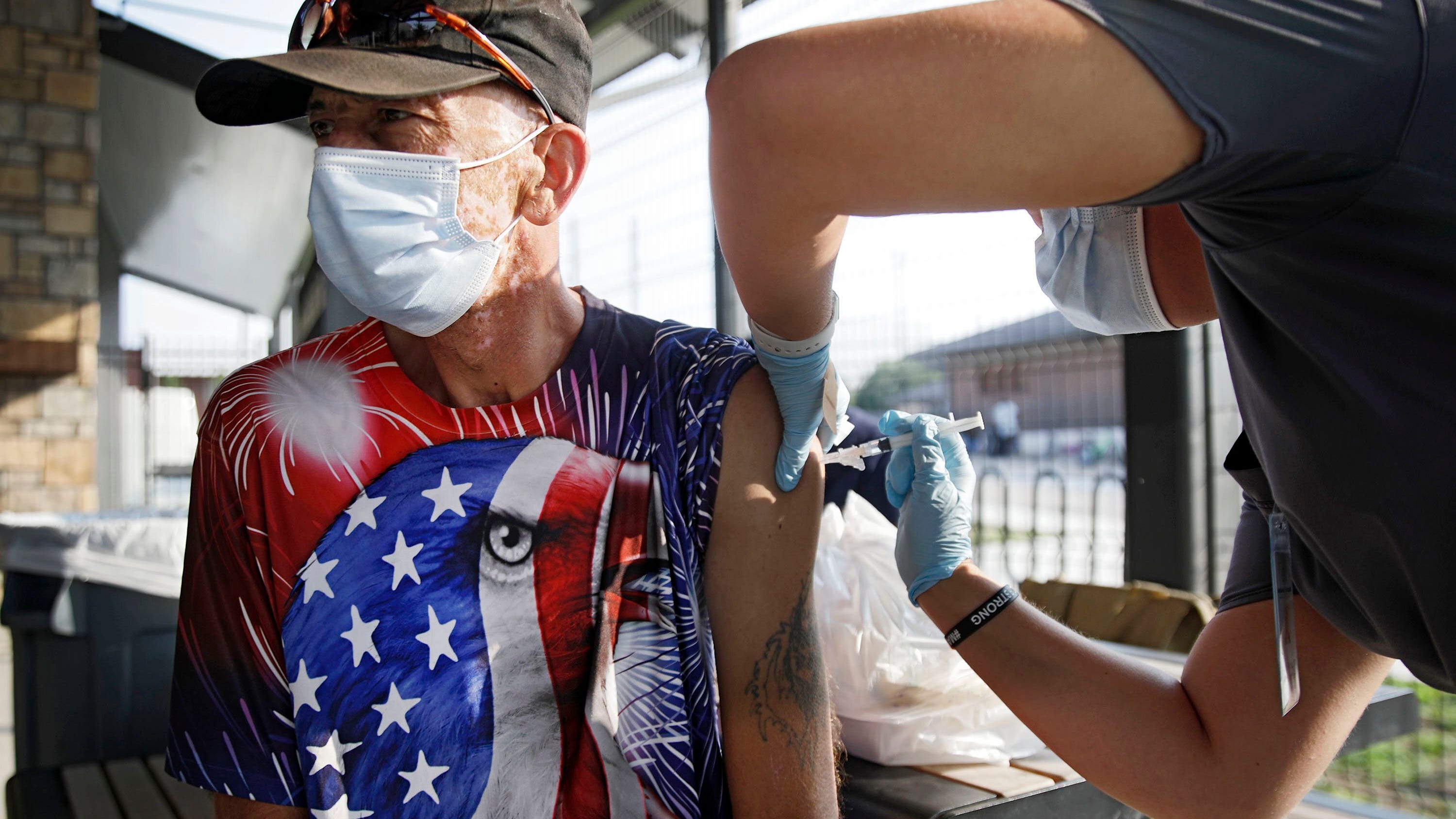 The Latest: Florida governor holds to anti-lockdown stance