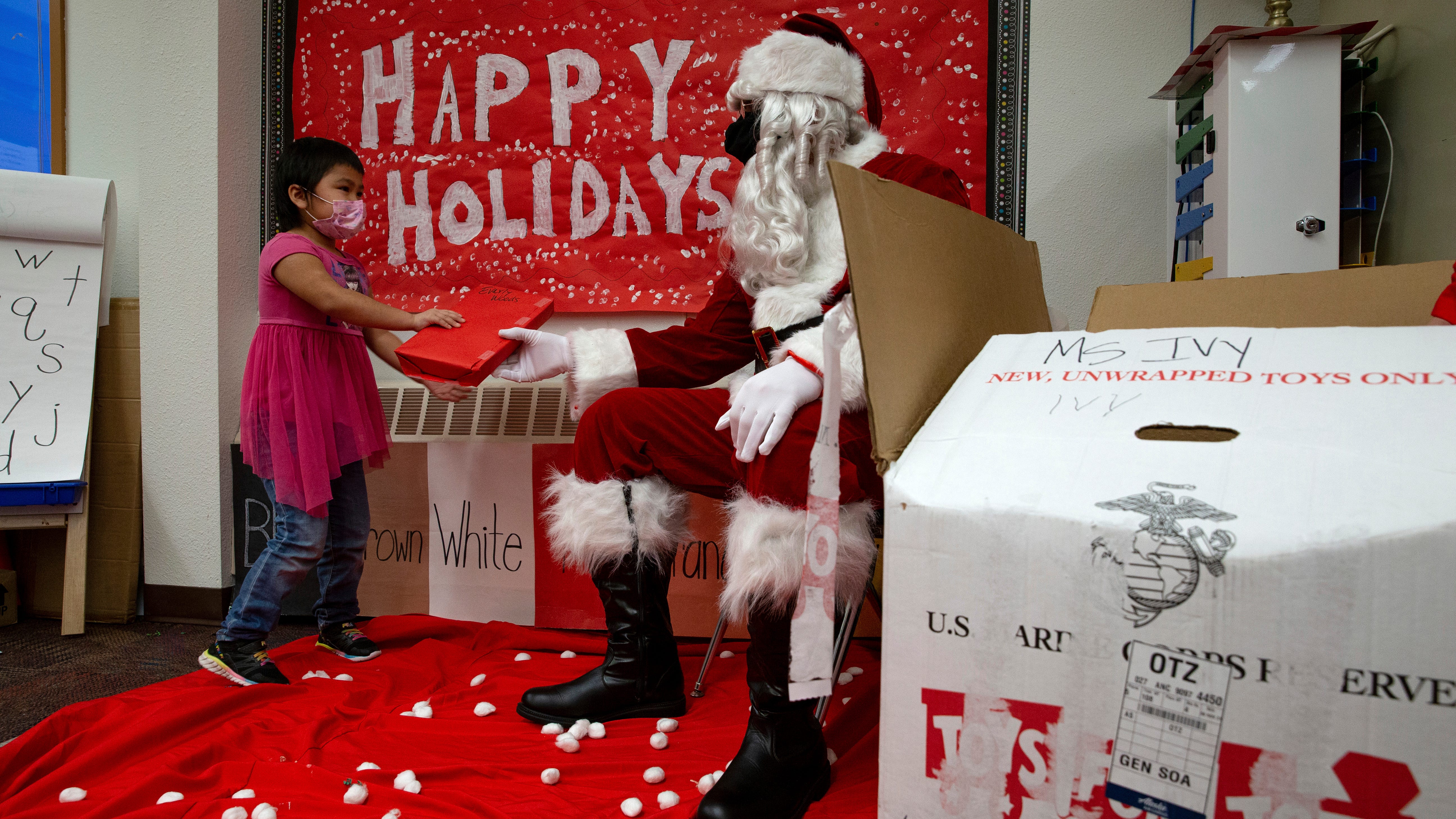 Marines on snowmobiles help Santa in Alaska's remote Arctic