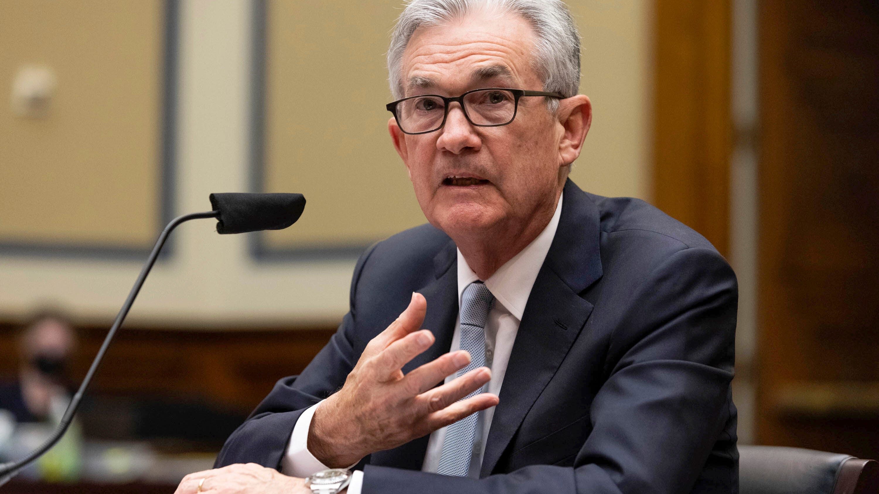 Powell says inflation, though elevated, will likely moderate