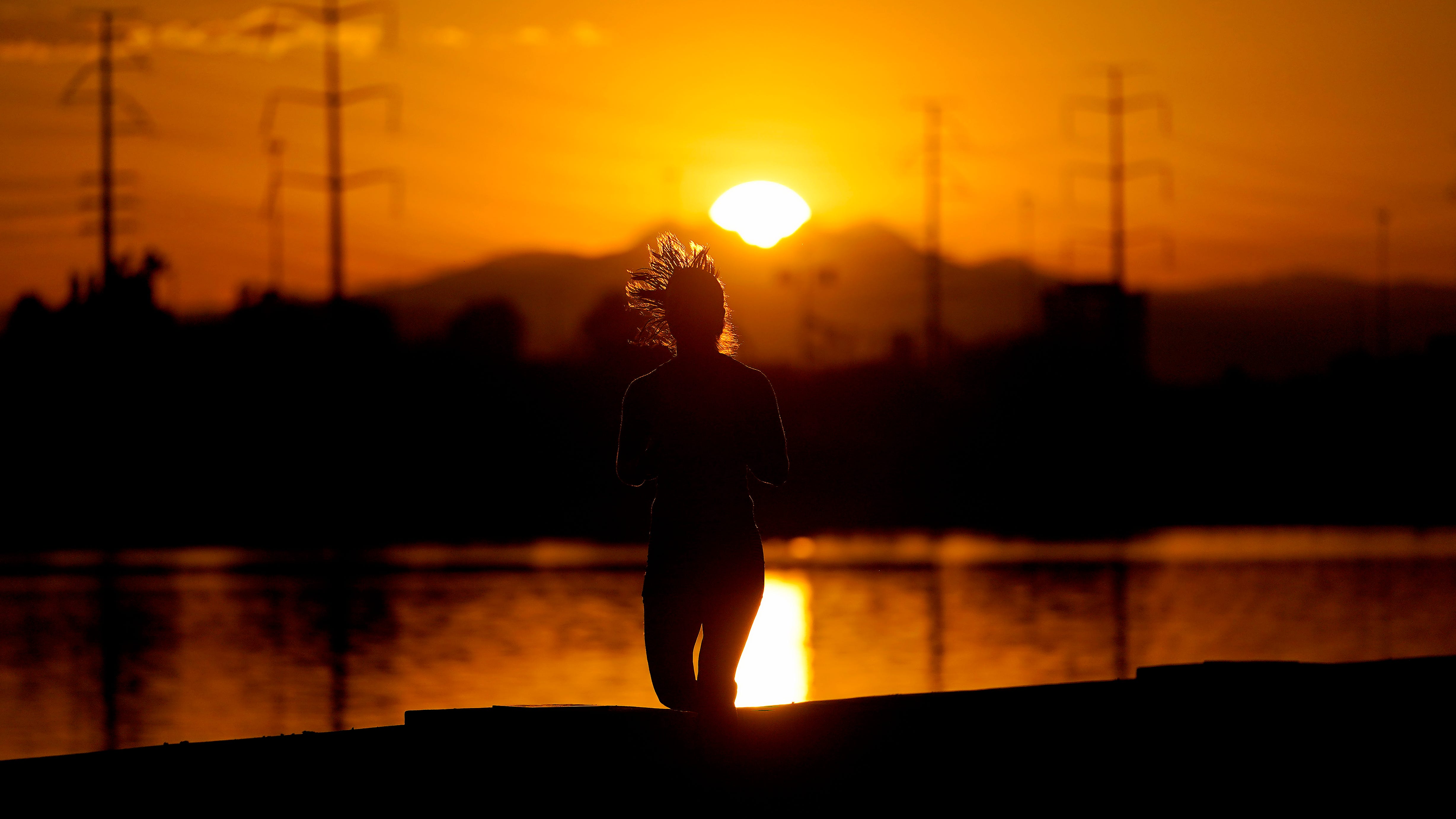 A heat wave has baked parts of the Southwest for weeks. Forecasters warn it's not cooling soon