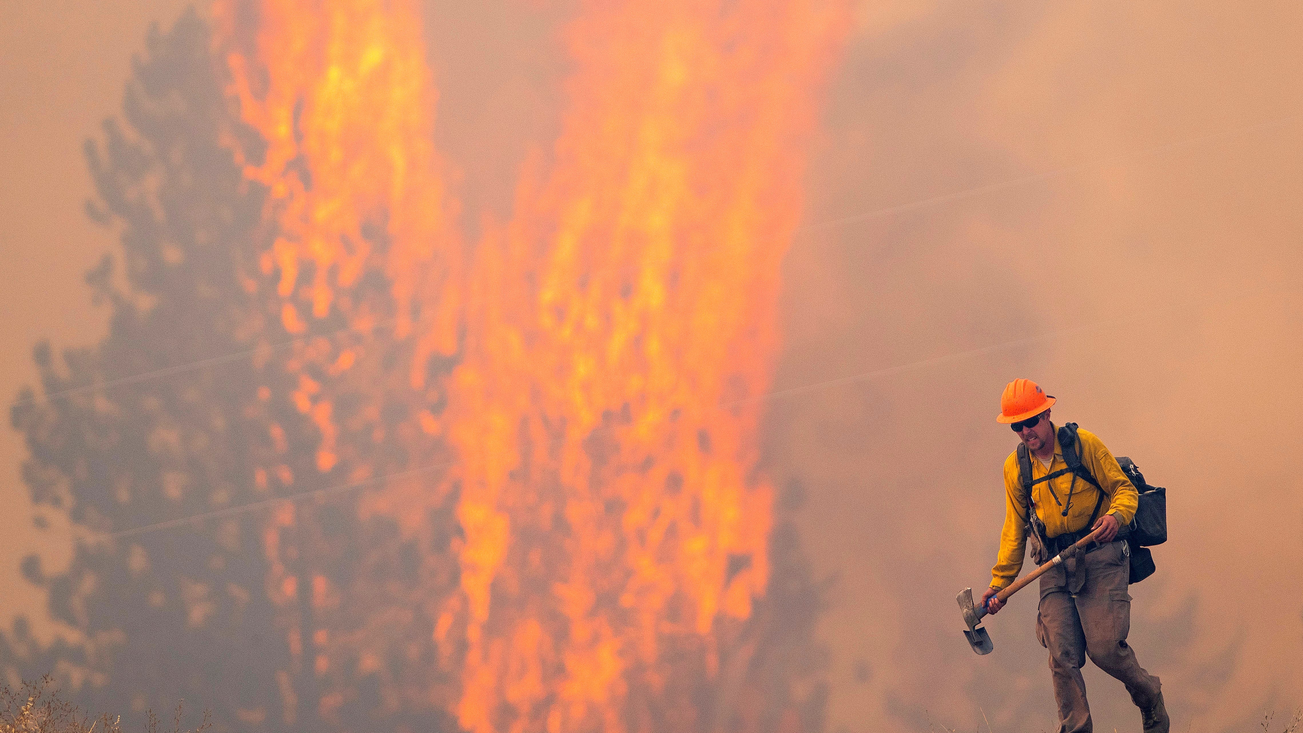 Wildfires threaten towns in Montana, California