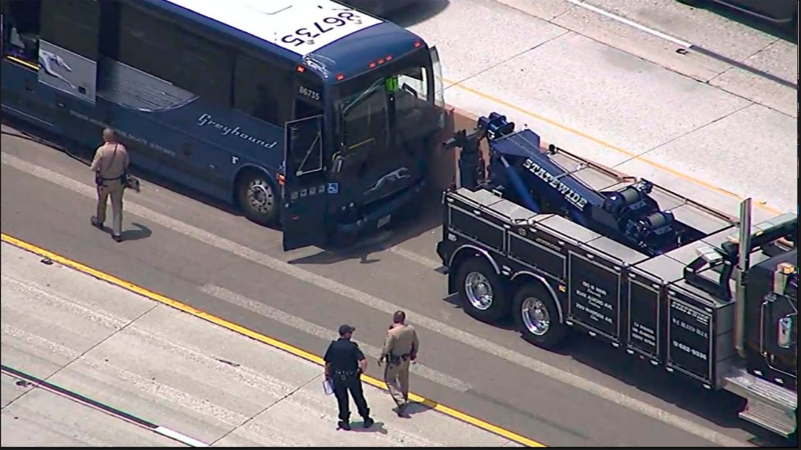 13 hurt when Greyhound bus blows tire on California highway