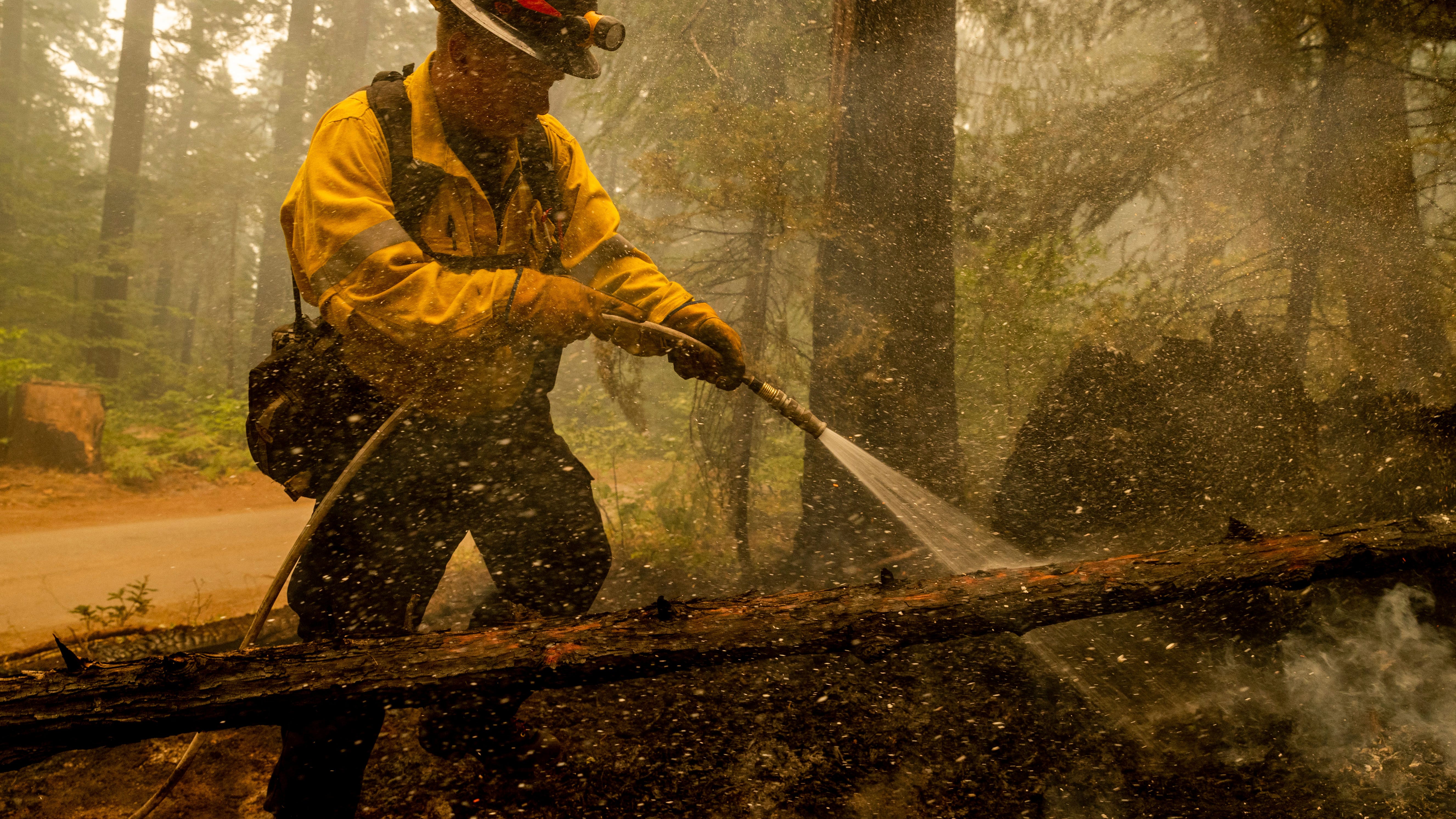 California wildfires destroy homes; winds hamper containment