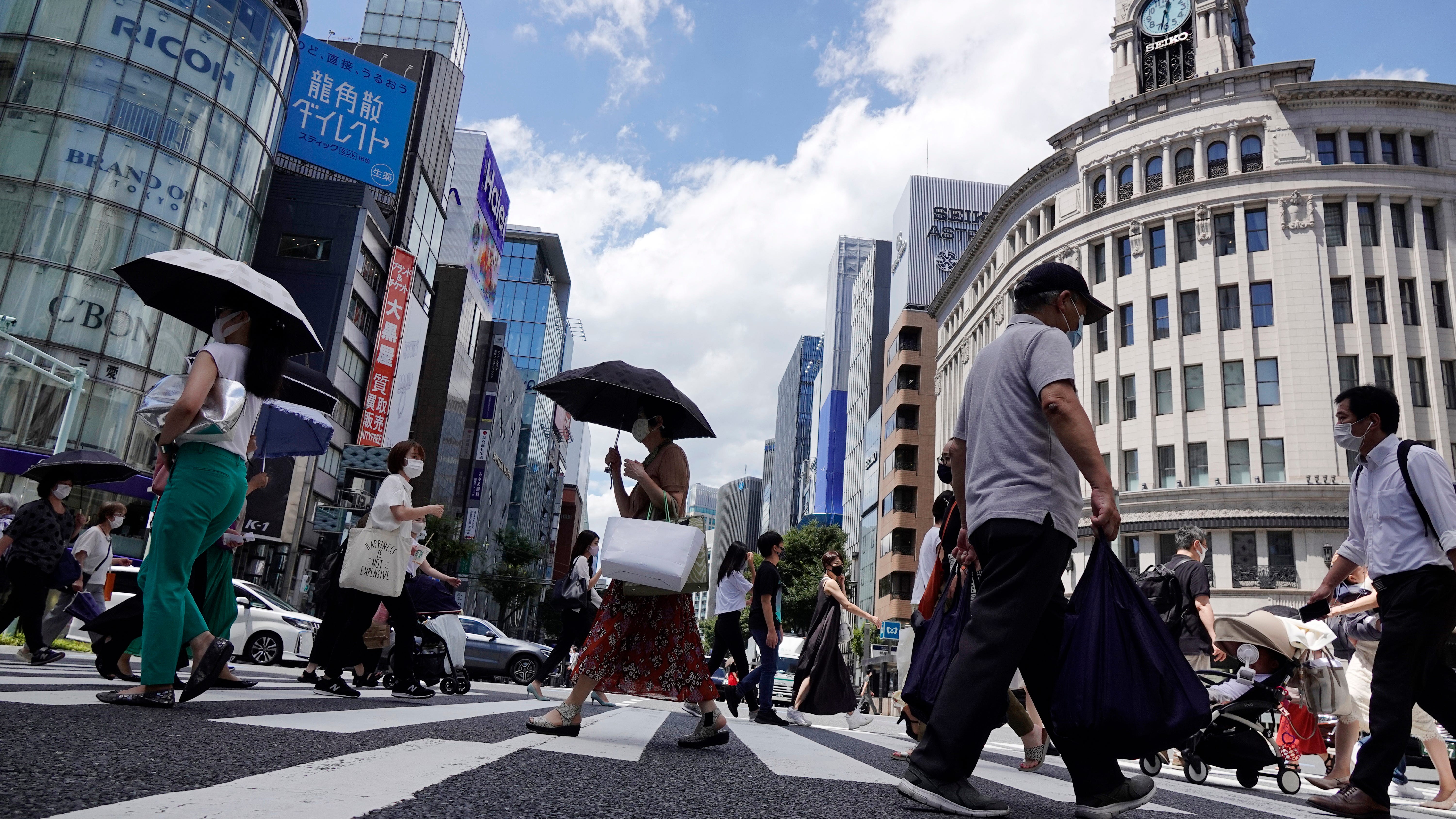 Olympics now ended, Japan races to vaccinate as virus surges