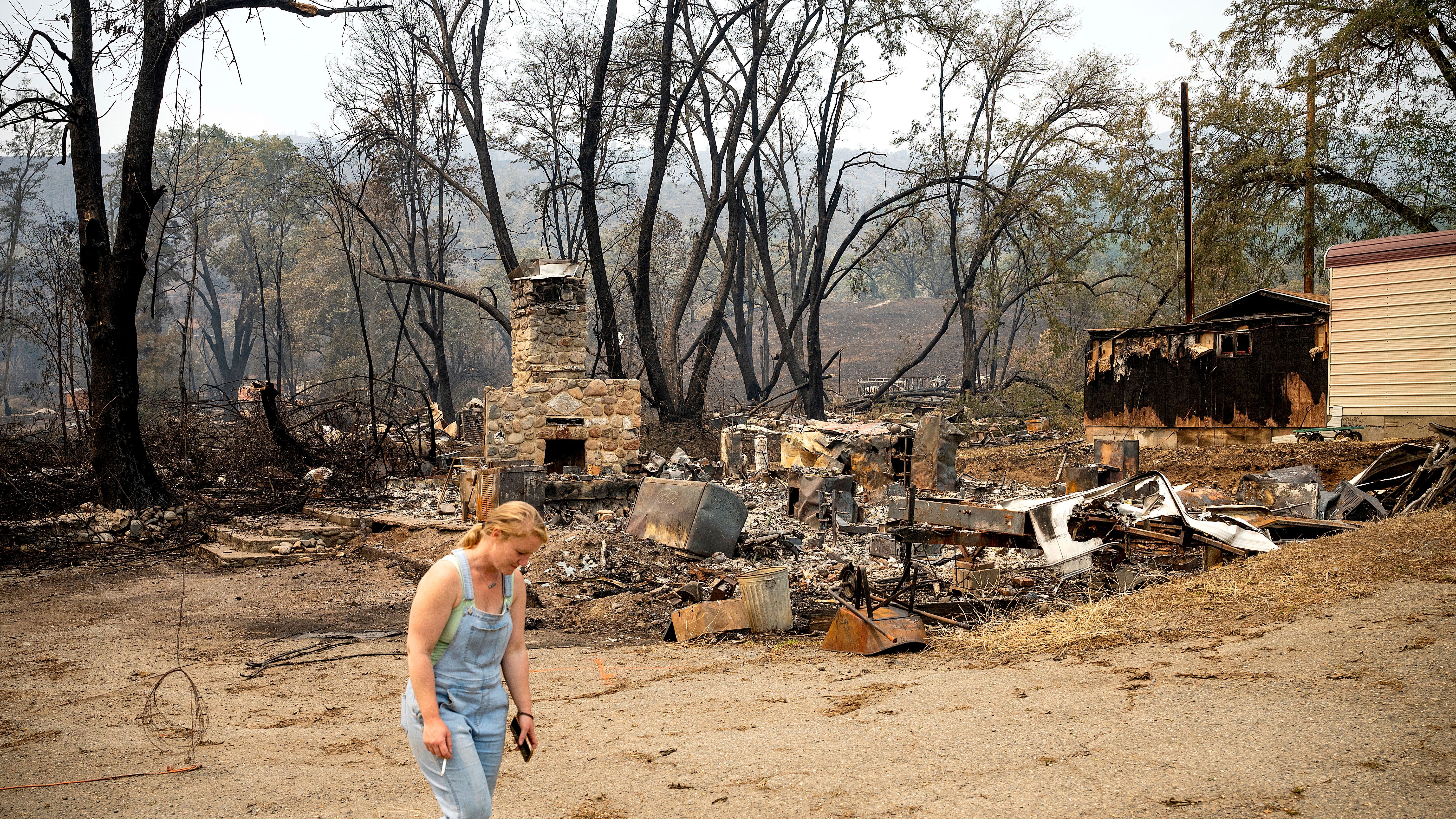 Wind-whipped fire leaves Northern California hamlet in ashes