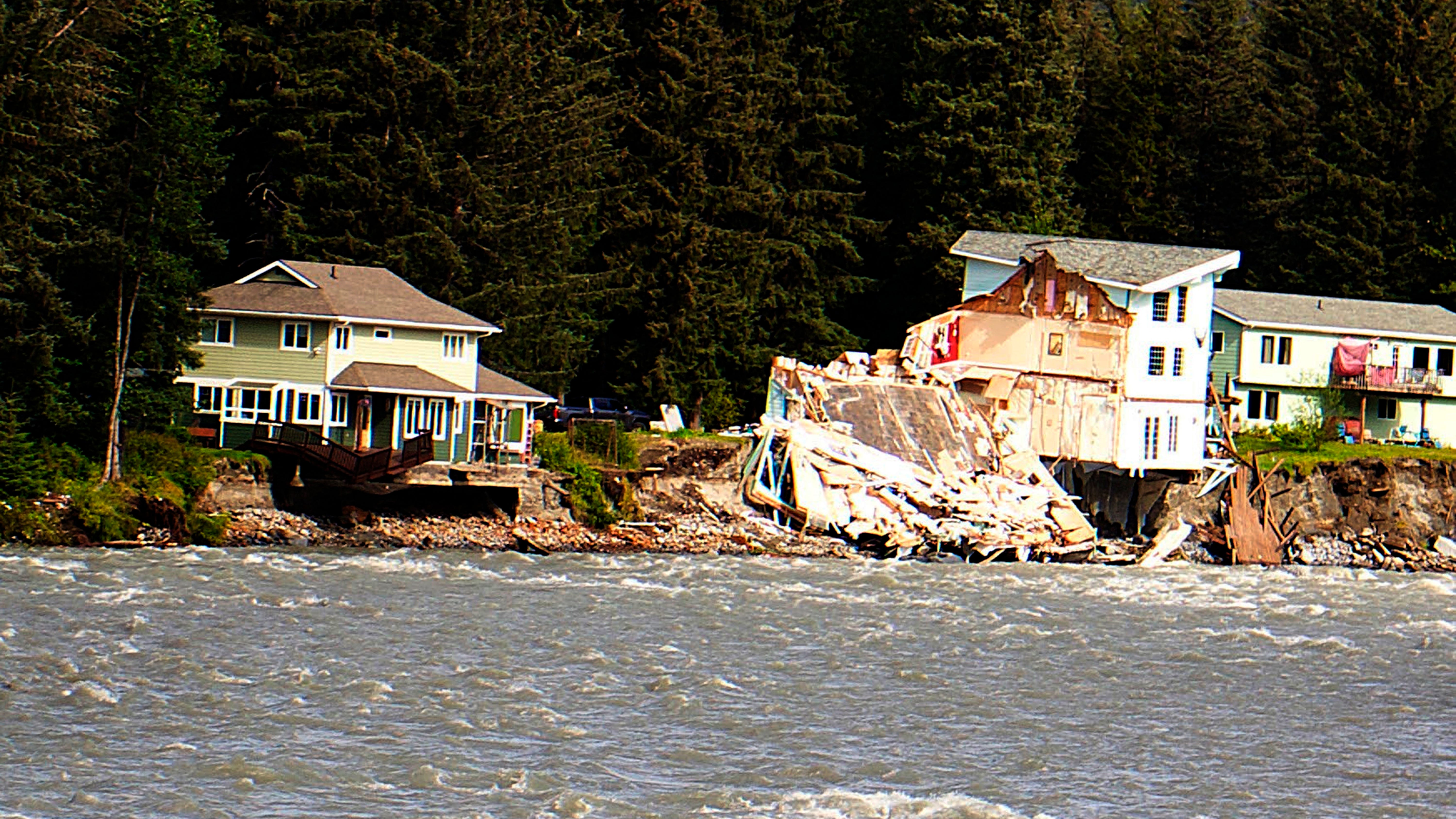 After a glacial dam outburst destroyed homes in Alaska, a look at the risks of melting ice masses