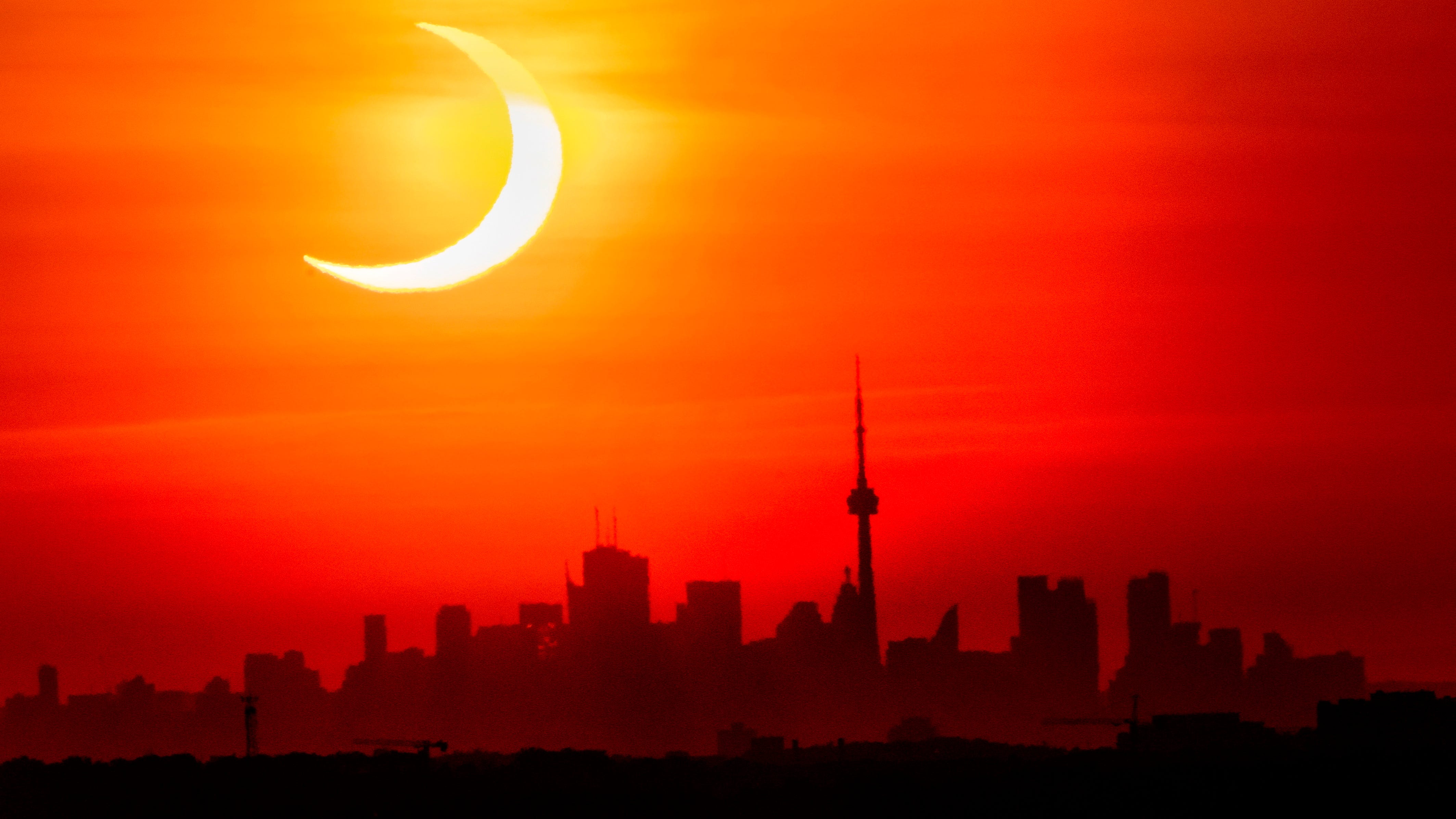 Sunrise special: Solar eclipse thrills world's northern tier