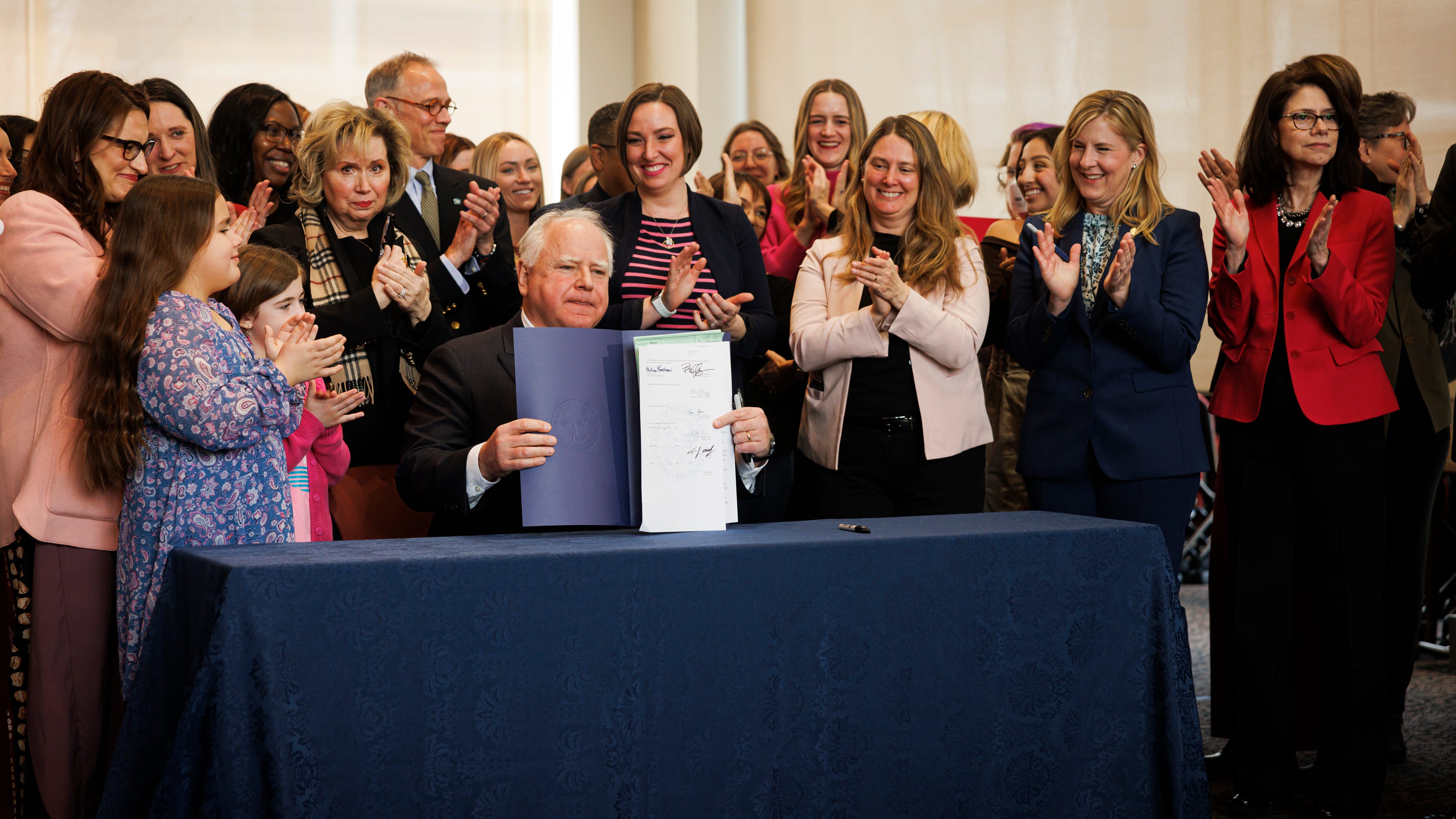Minnesota governor signs broad abortion rights bill into law