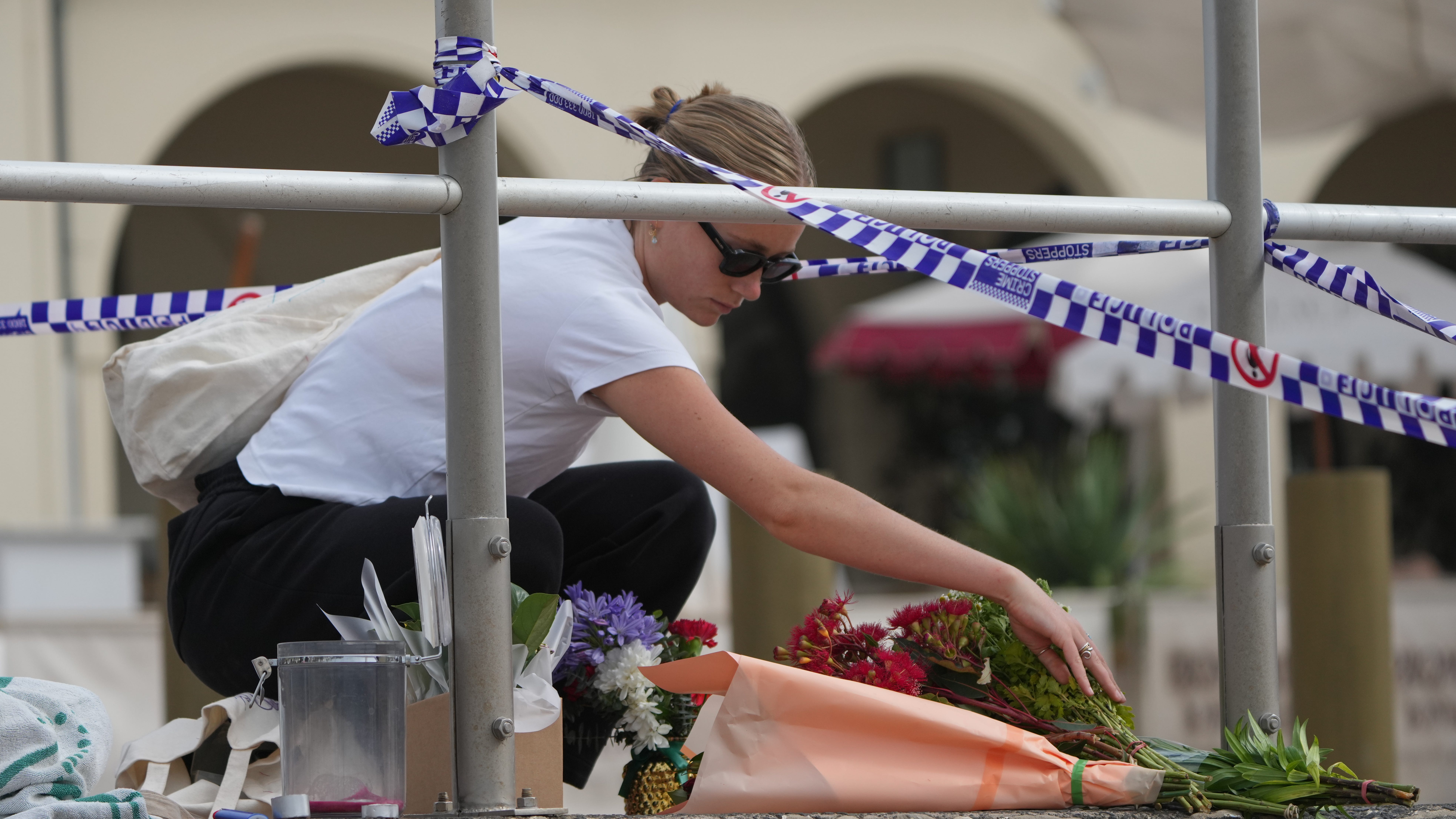 Father and son gunmen kill at least 15 people in attack on Hanukkah event at Sydney's Bondi Beach
