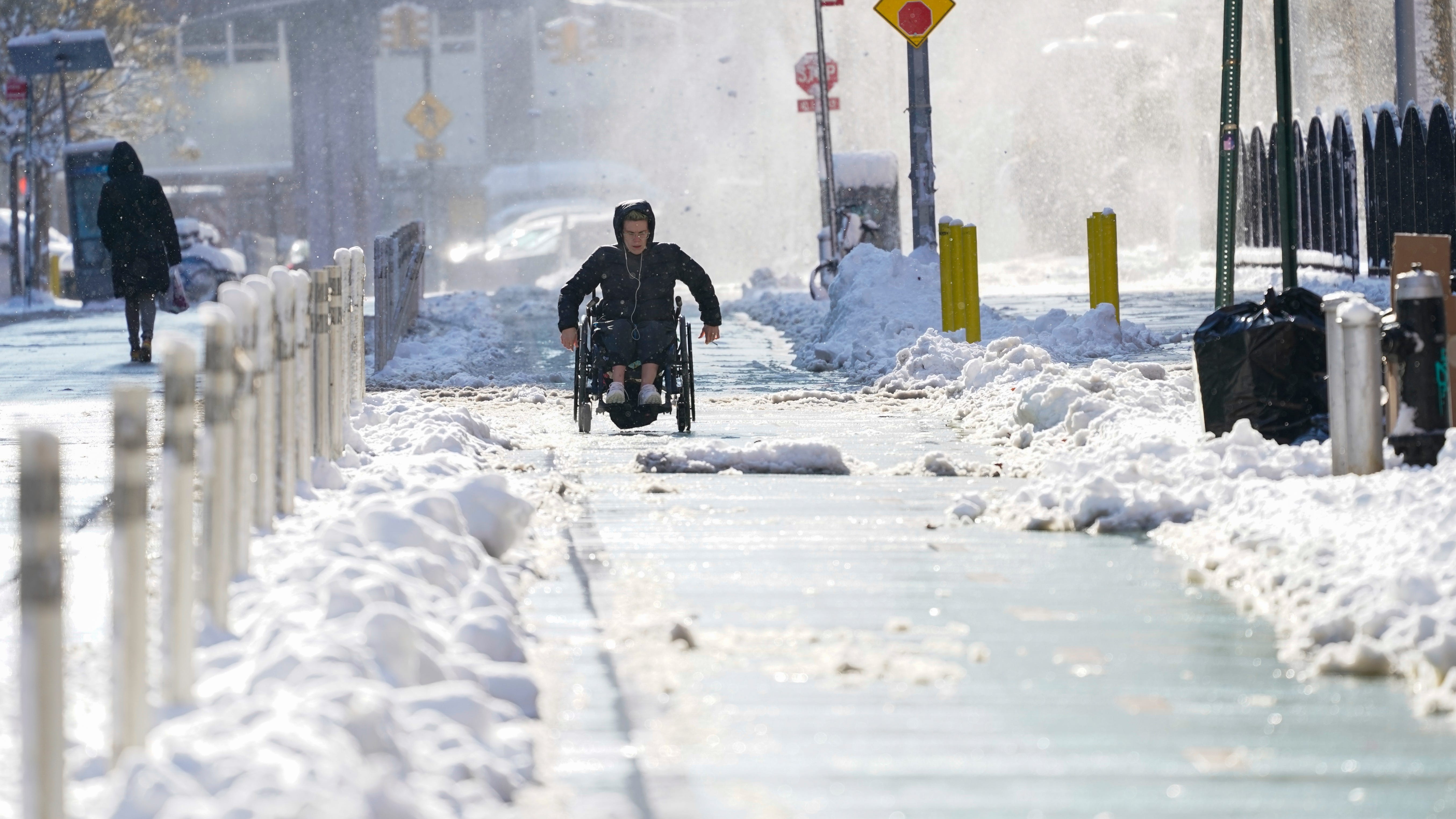 Winter storm snarls travel, gives some schools the day off