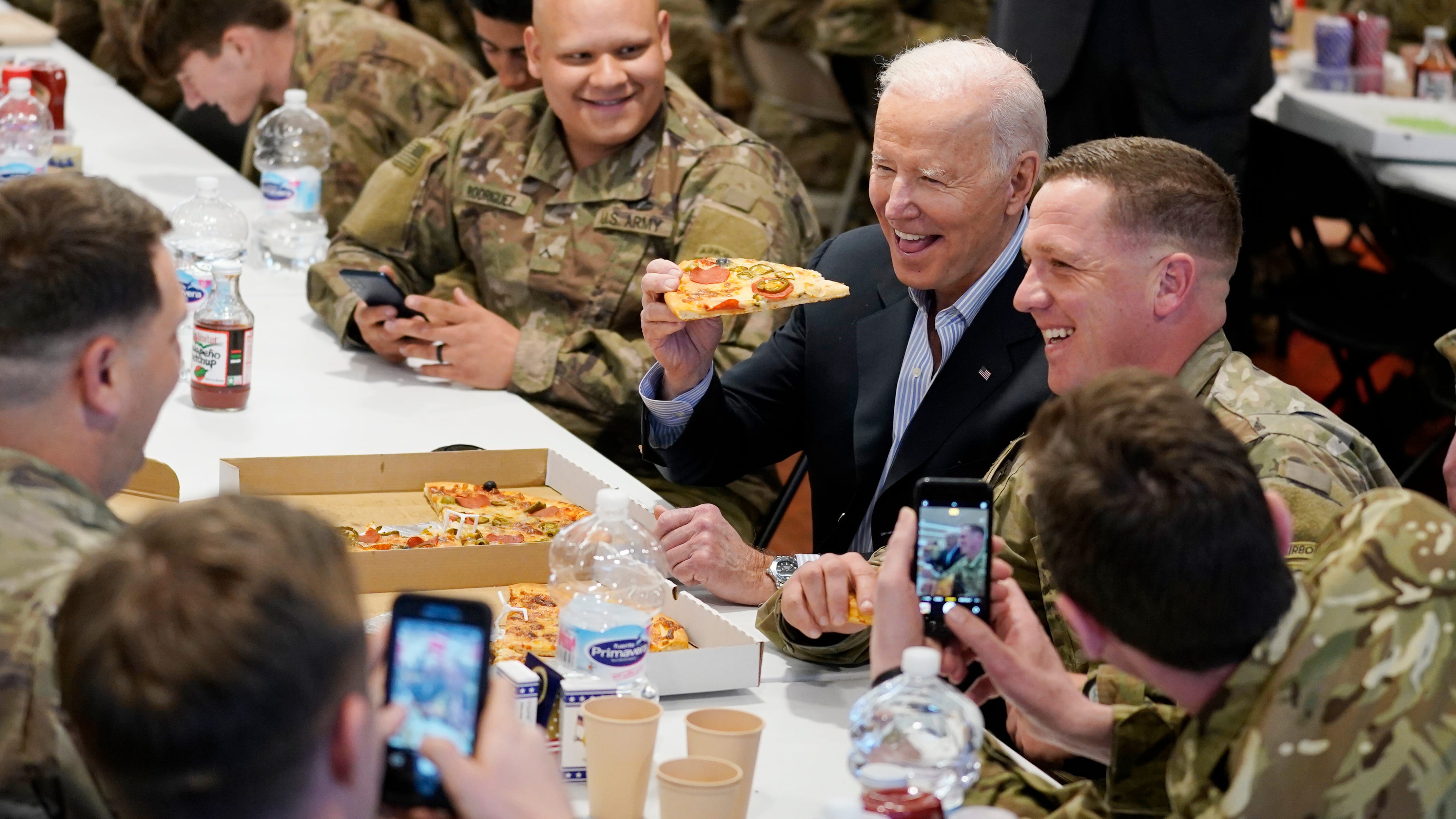 60 miles from Ukraine, Biden sees refugee crisis in Poland