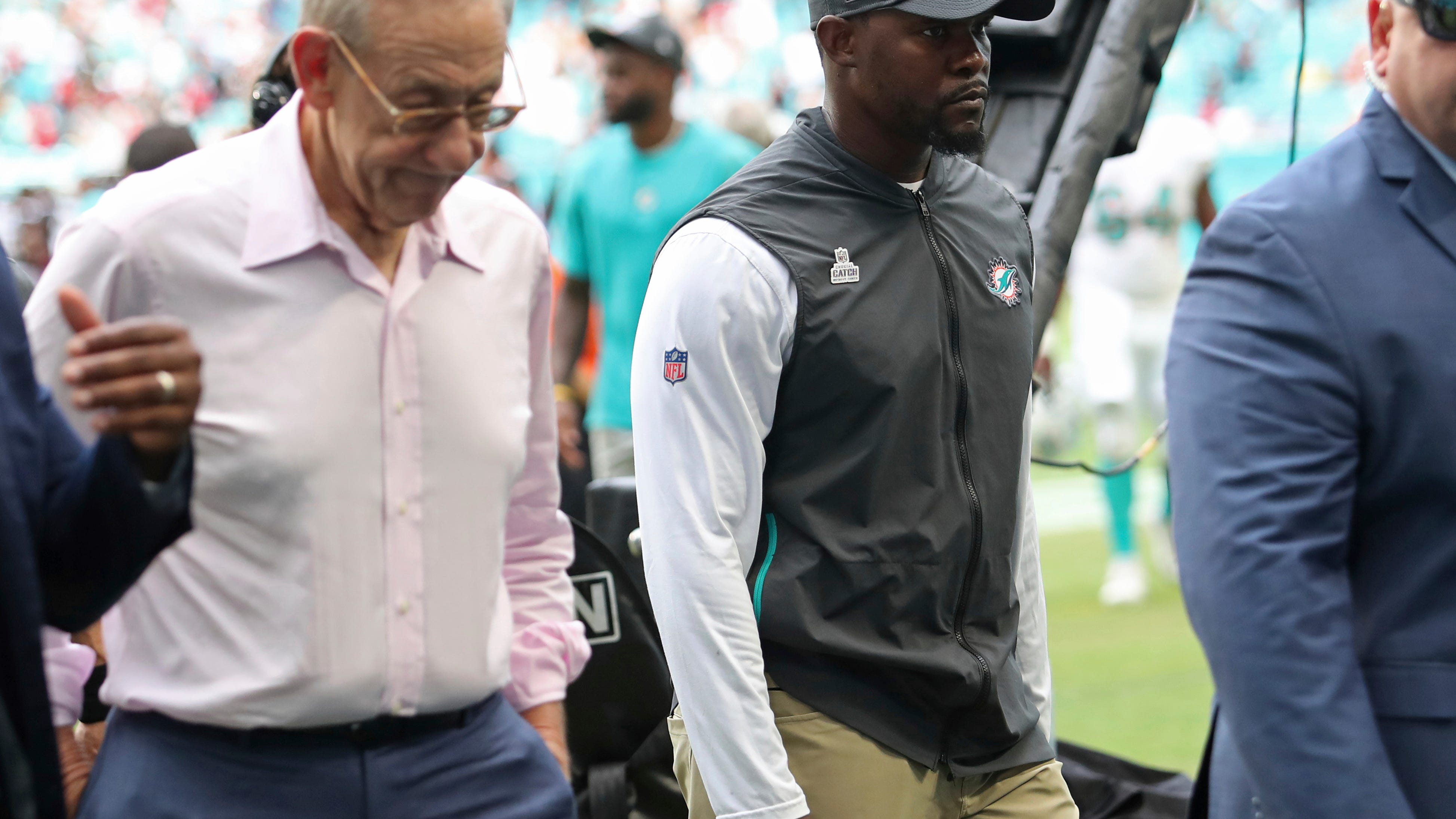 Flores says he won't drop lawsuit even if hired as coach