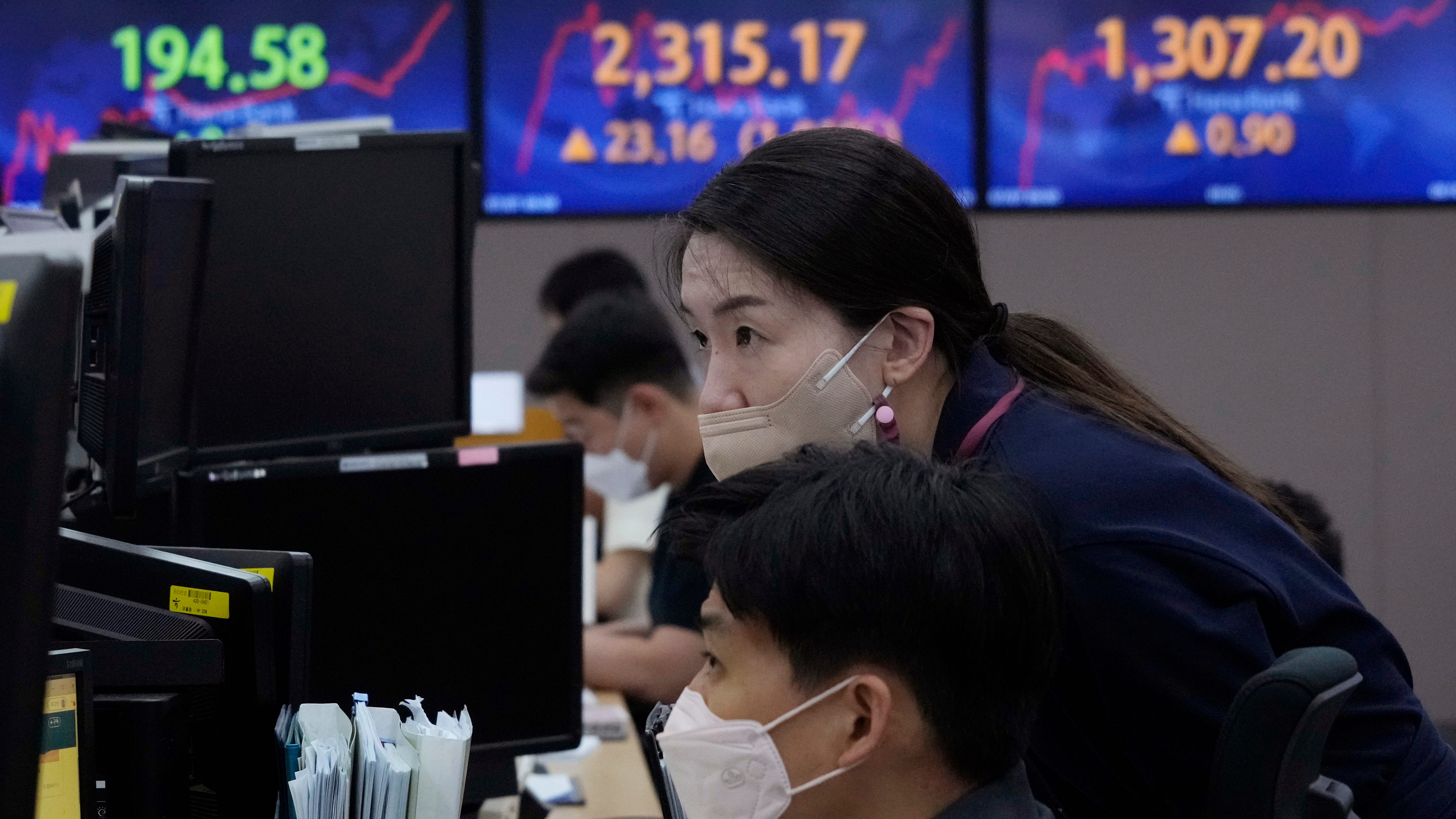 Global stocks higher after Fed says rate hikes may be needed