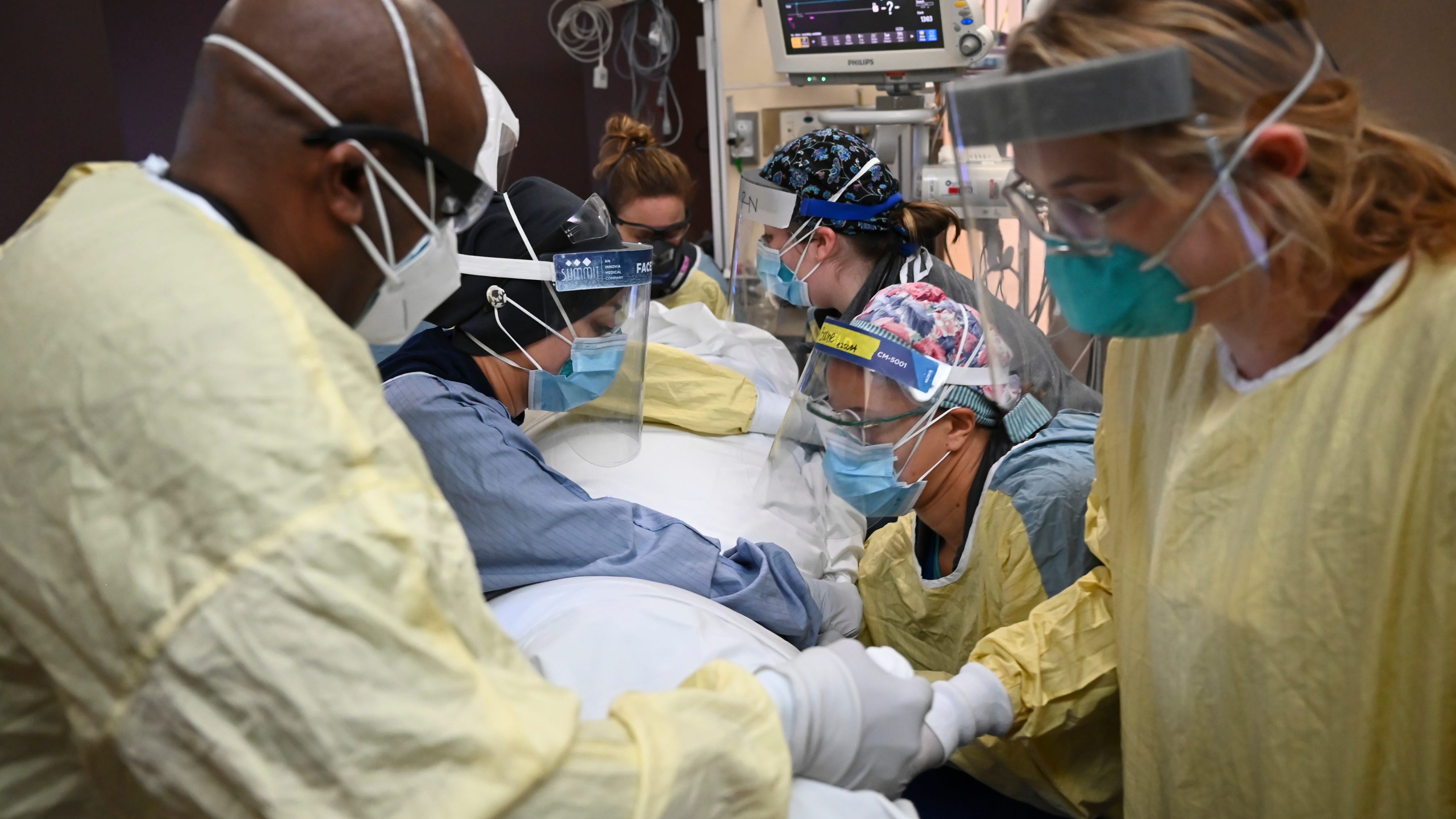 US virus deaths hit record levels with the holidays ahead