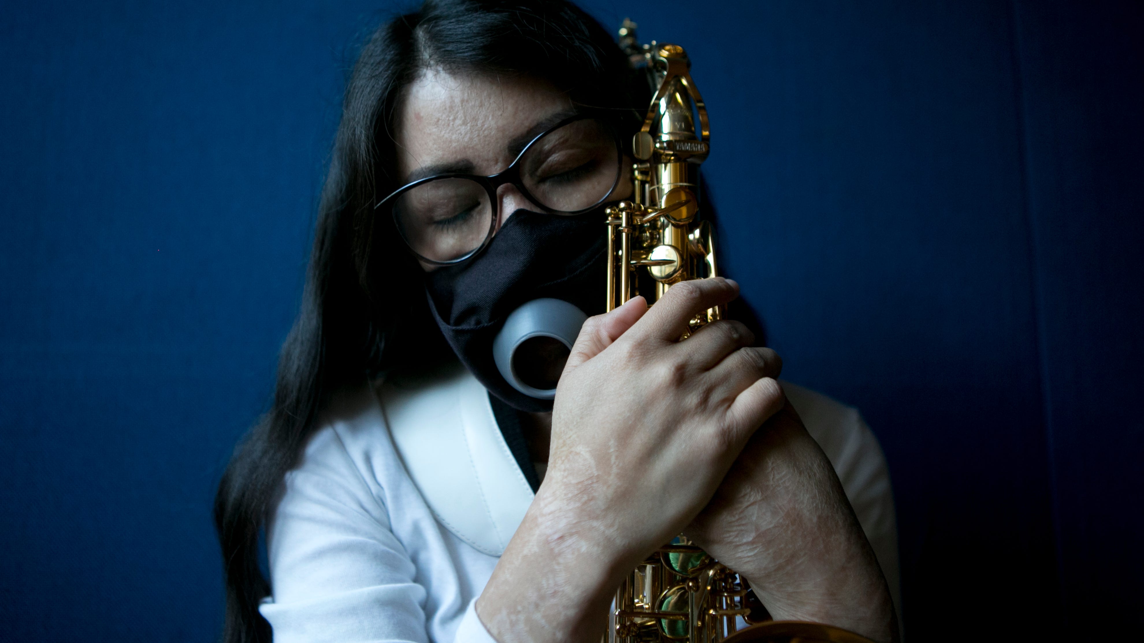 Mexican musician finds refuge in saxophone after acid attack
