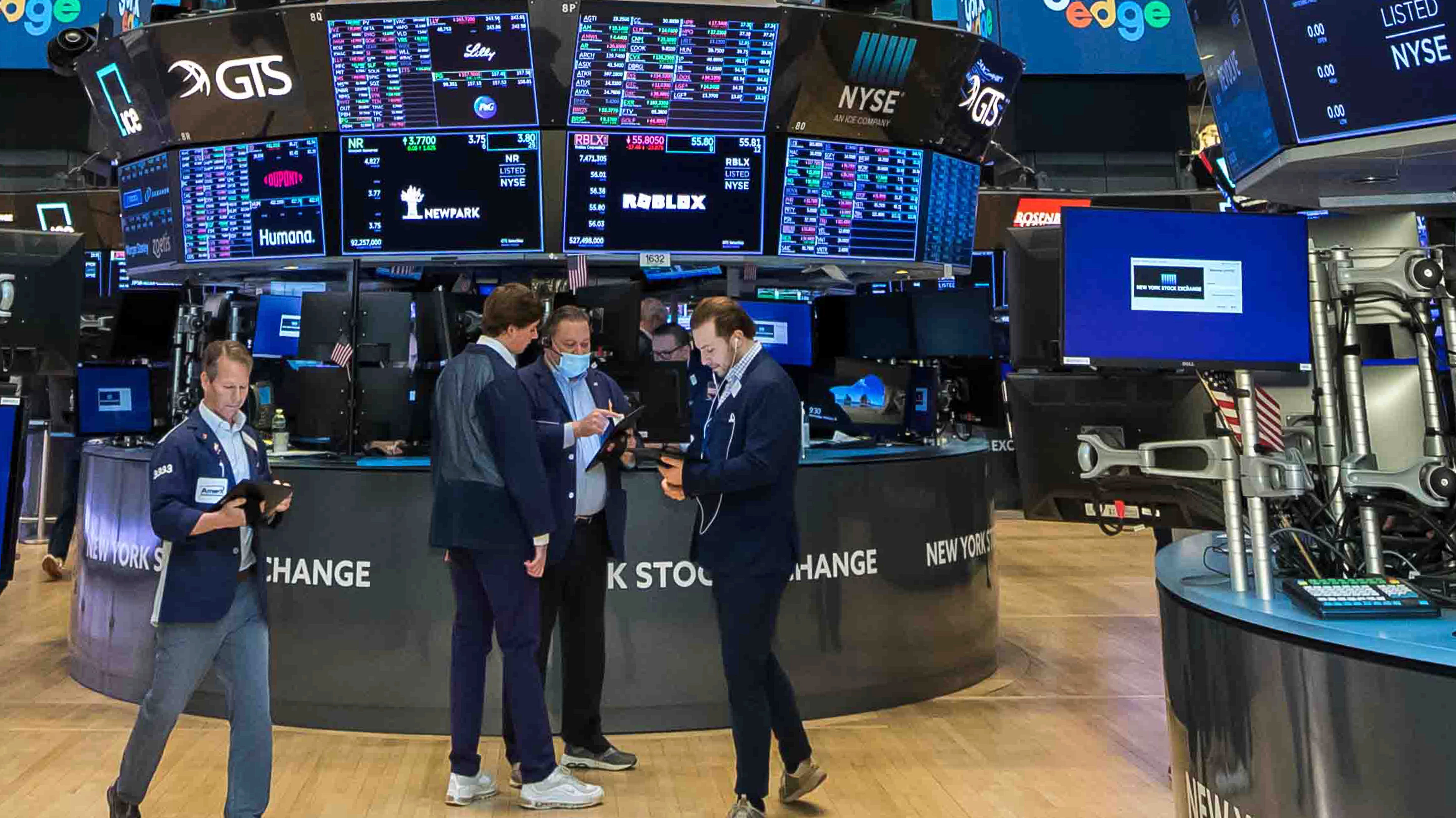 Stocks end mixed as traders parse next rate move by the Fed