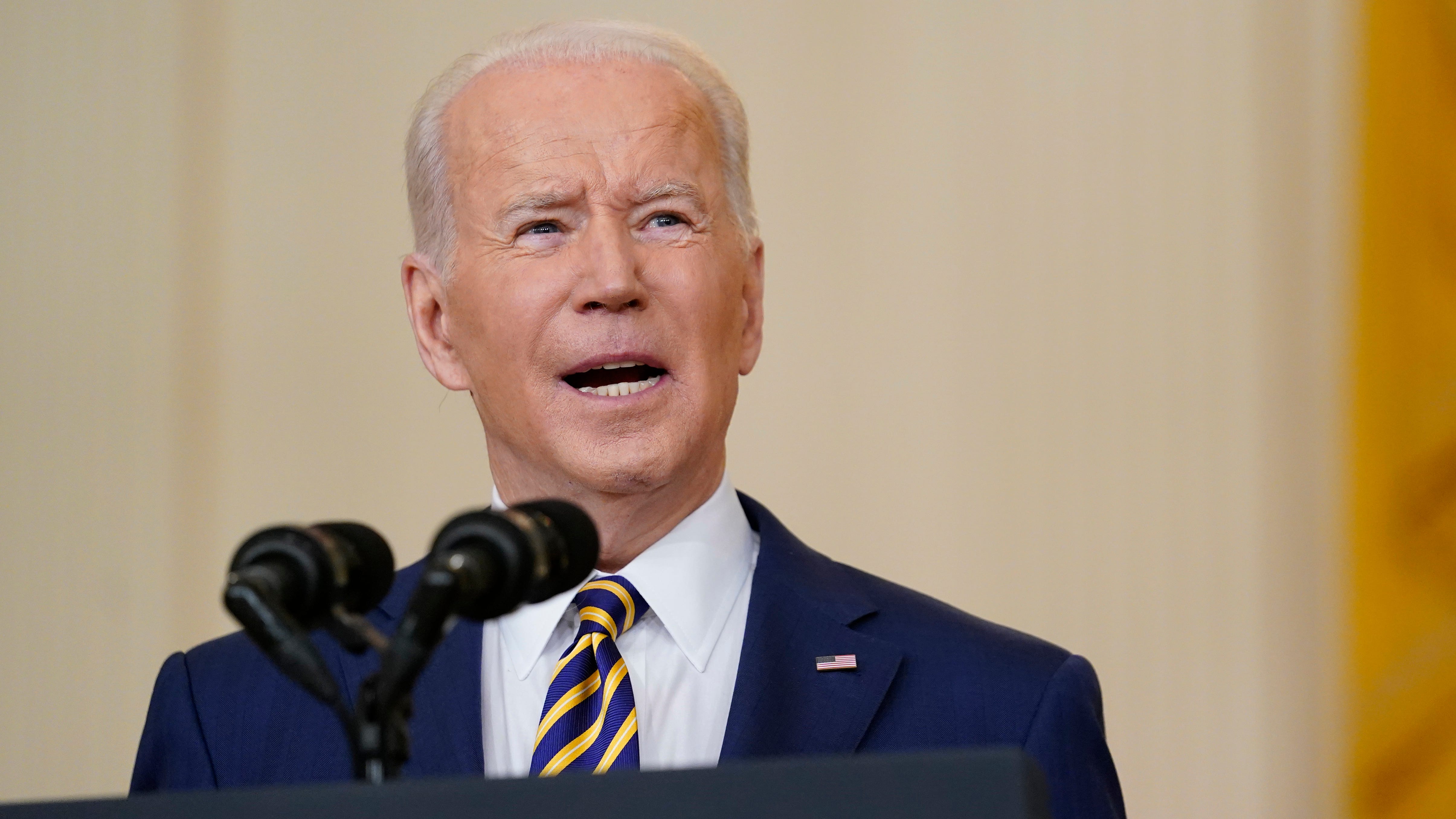 Biden says nation weary from COVID, but US in a better place