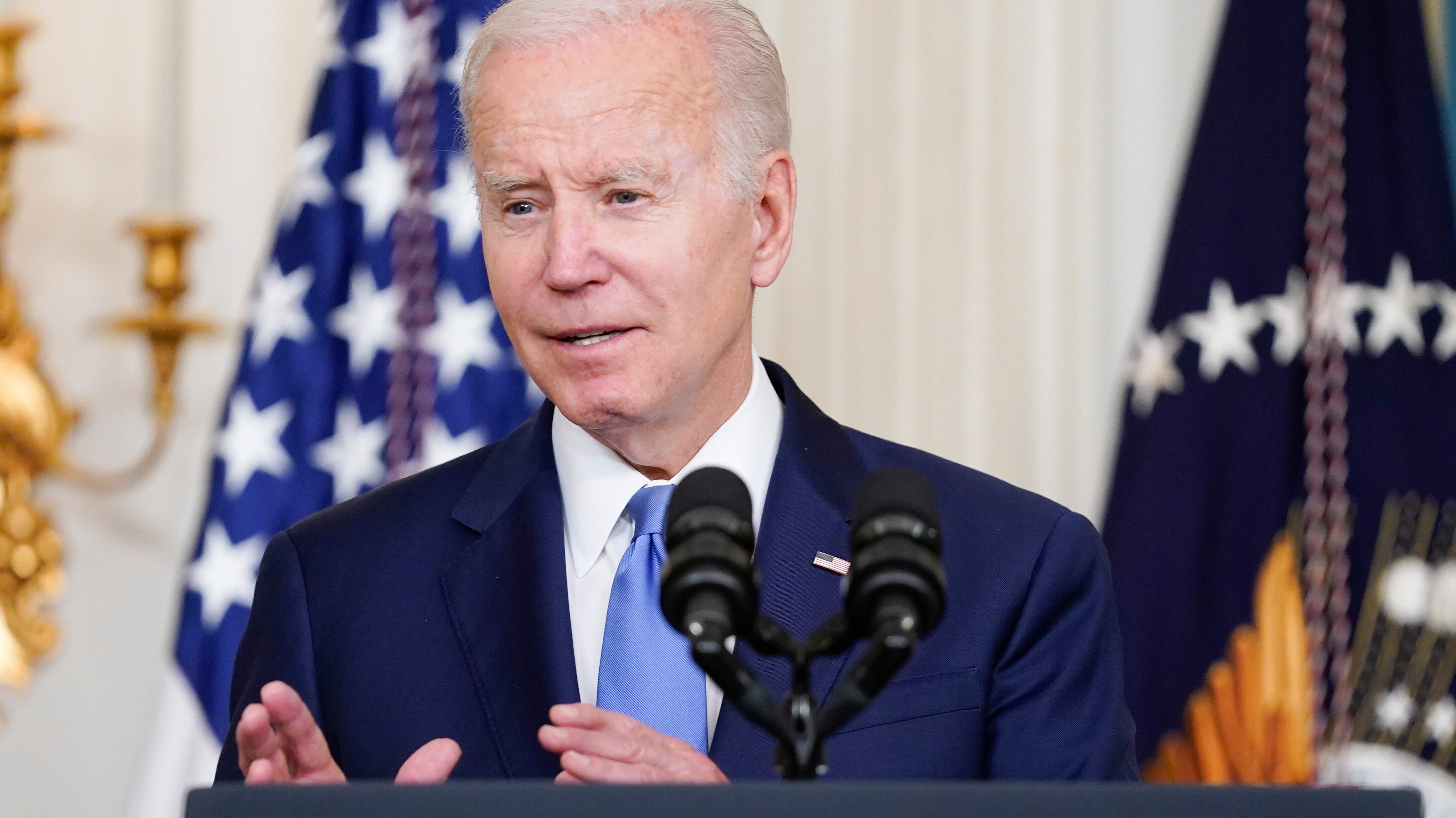 Biden signs new shipping law he says can cut consumer costs