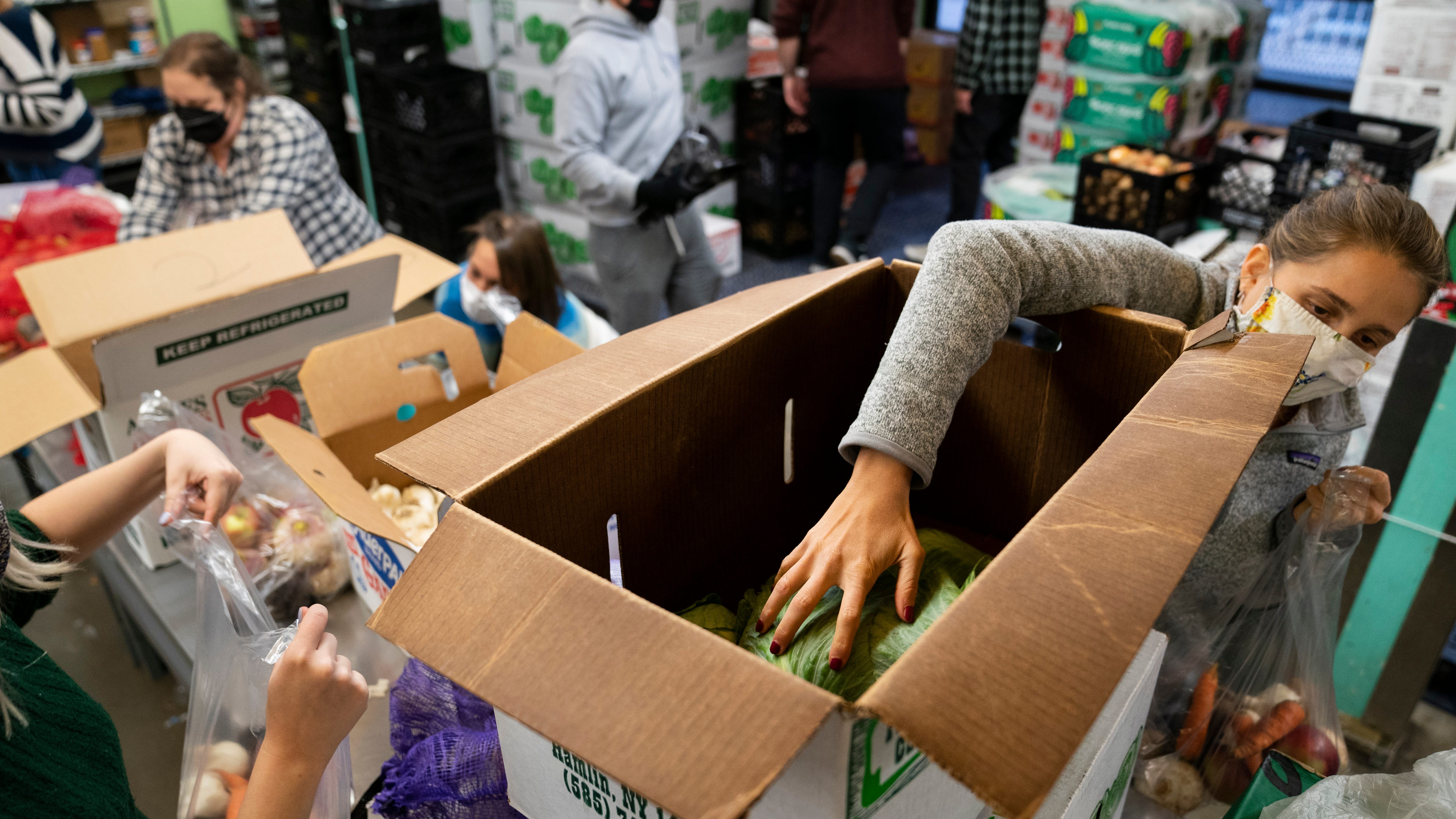 Food banks see more volunteers, but uncertainty looms 