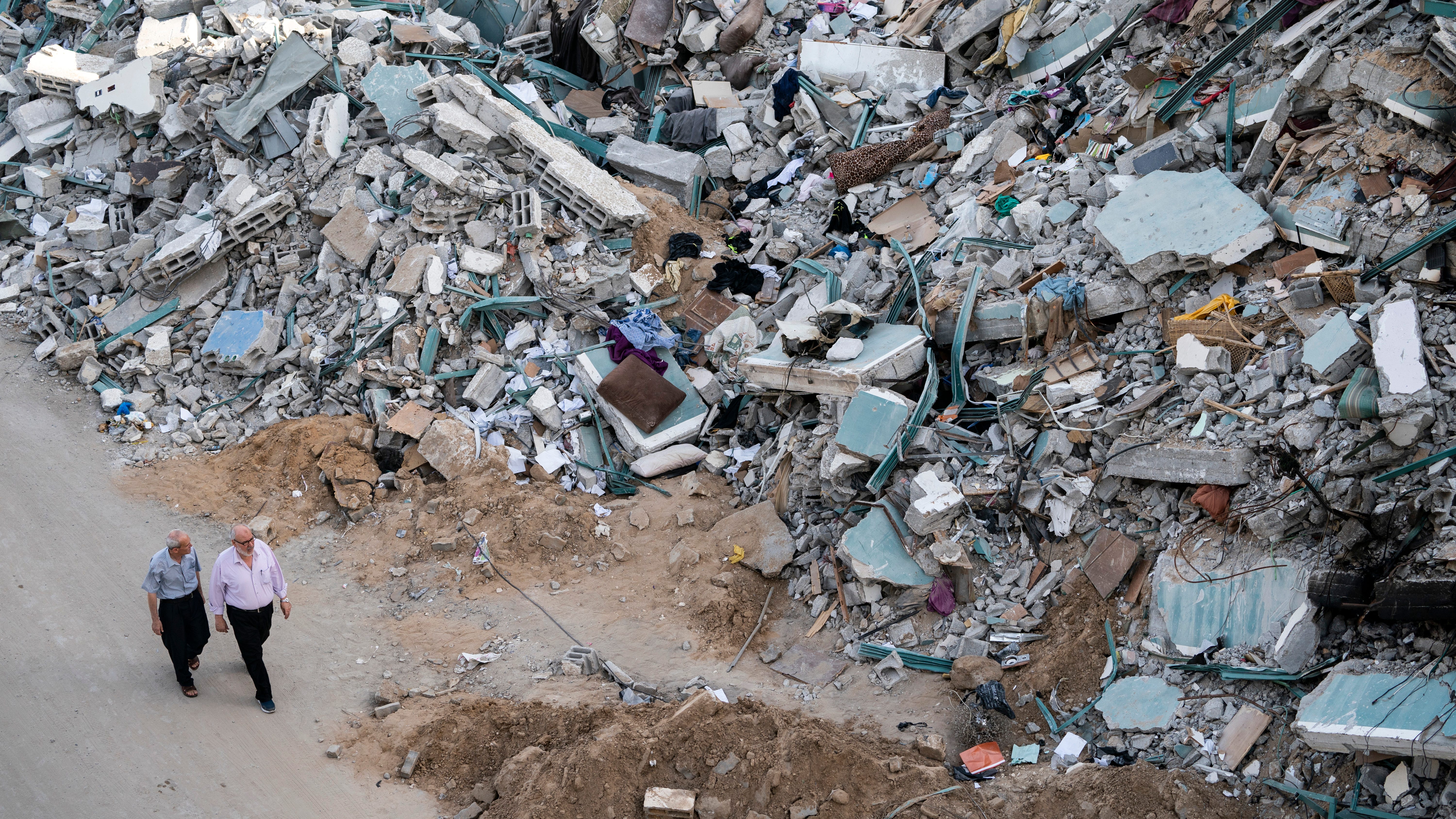 Palestinians see victory in Gaza truce as Israel warns Hamas
