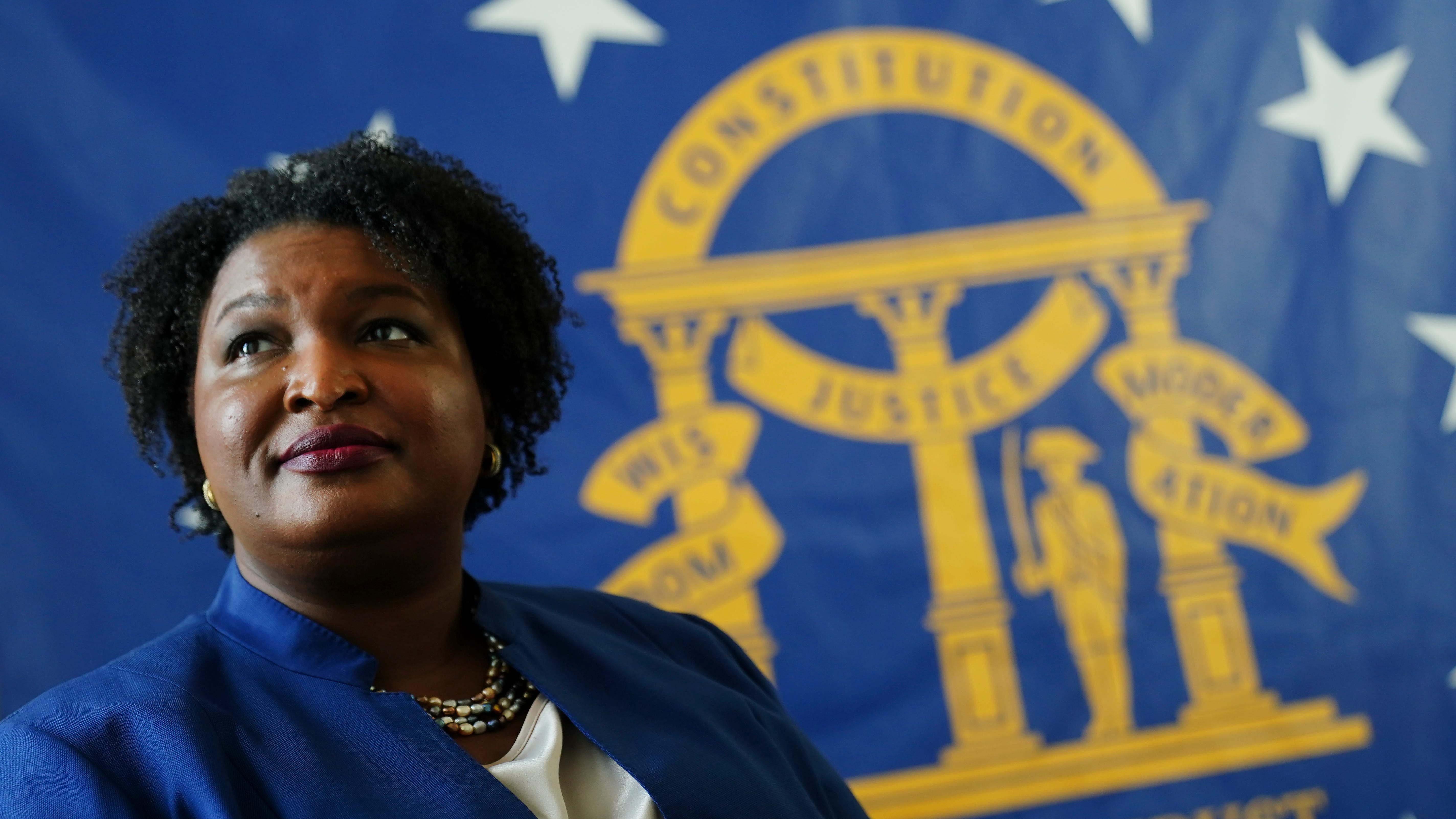 Abrams calls for using budget surplus to invest in Georgians