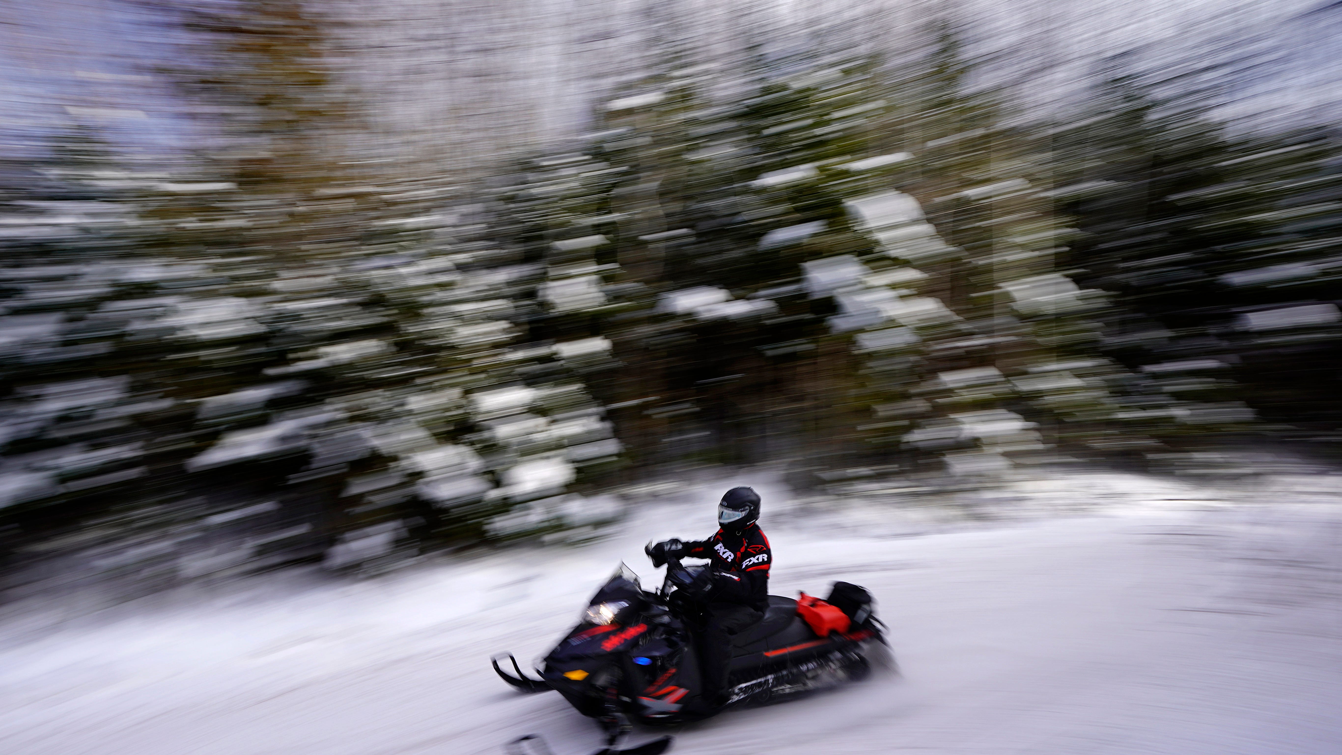 Masks, social distancing and speed: Snowmobiles enjoy boom