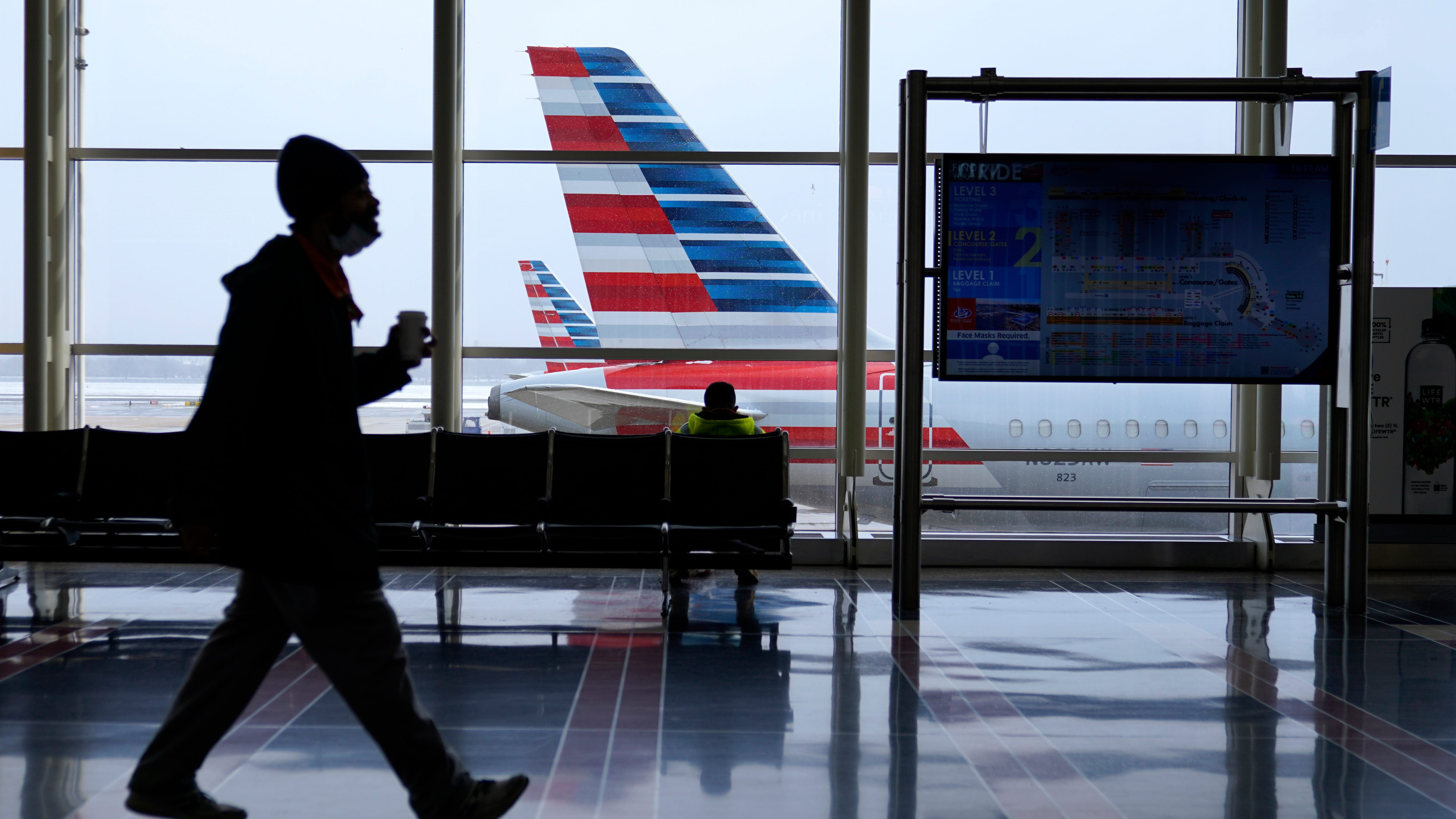 Airport crowds, airline ticket sales show travel recovering
