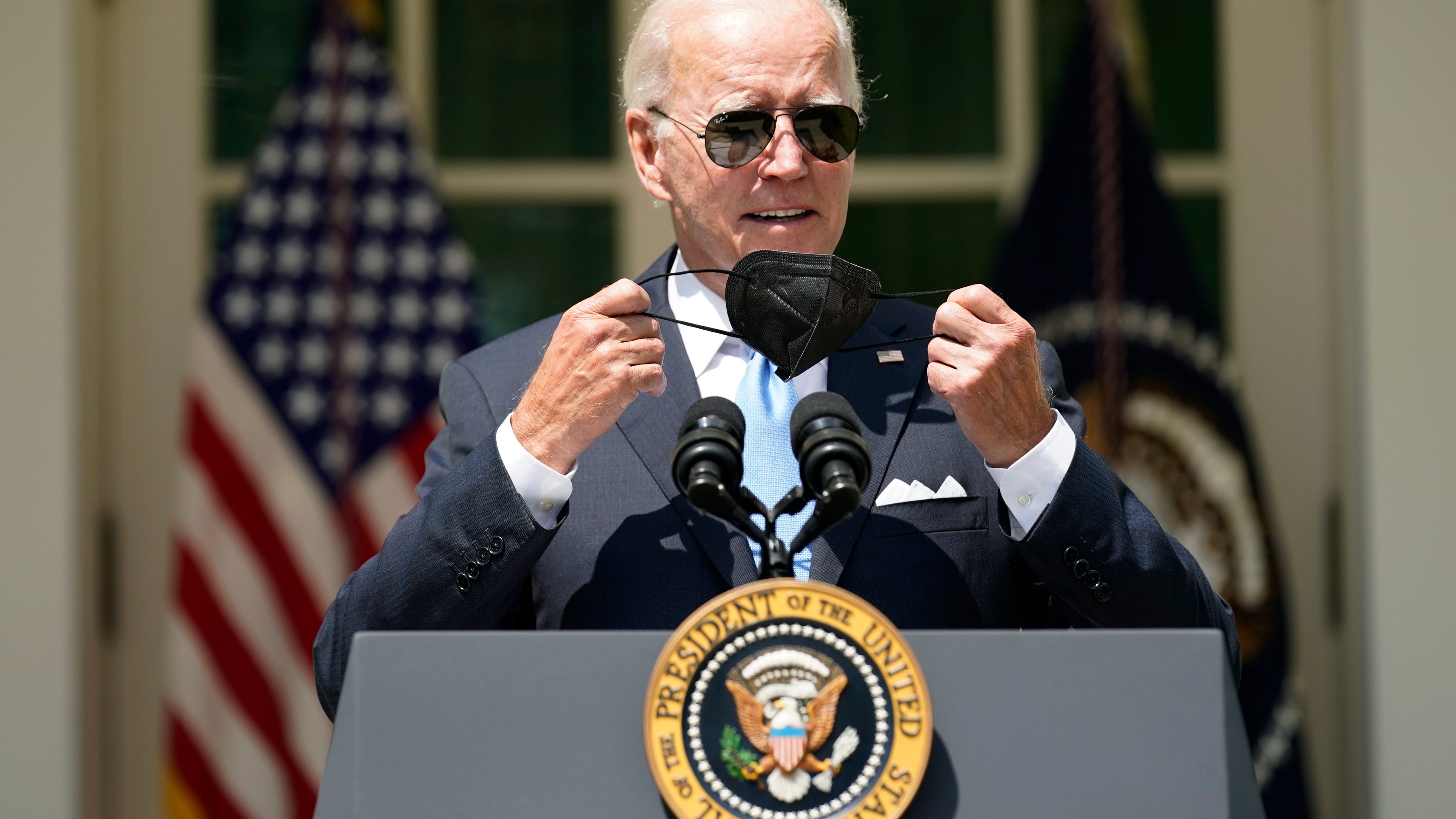 Biden emerges from COVID isolation, tells public: Get shots