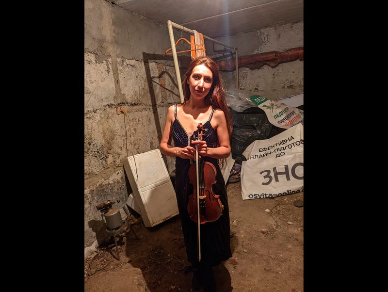 CORRECTION Russia Ukraine Besieged City Violinist Plays