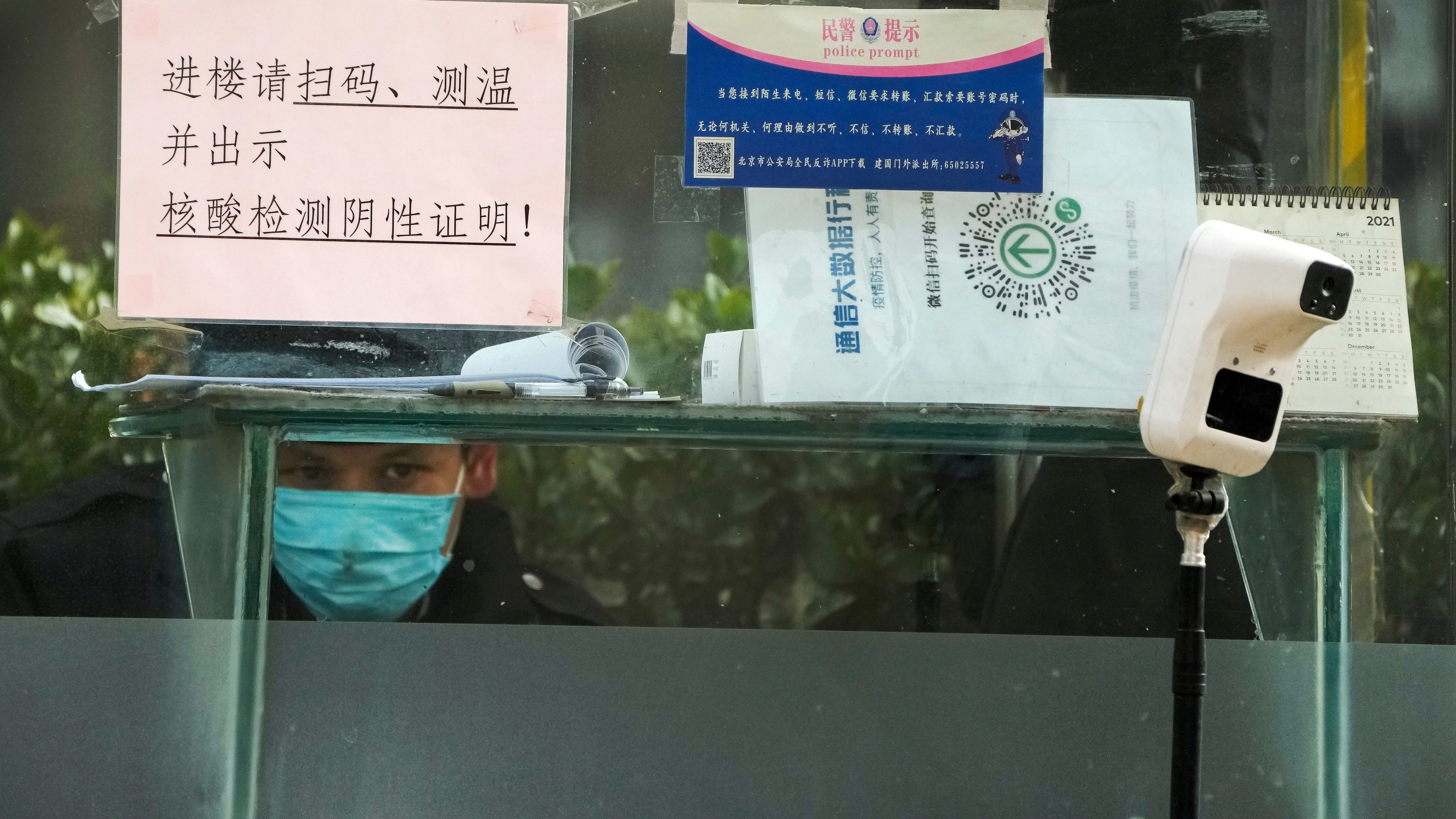China vows to drop some travel tracking in COVID rule easing