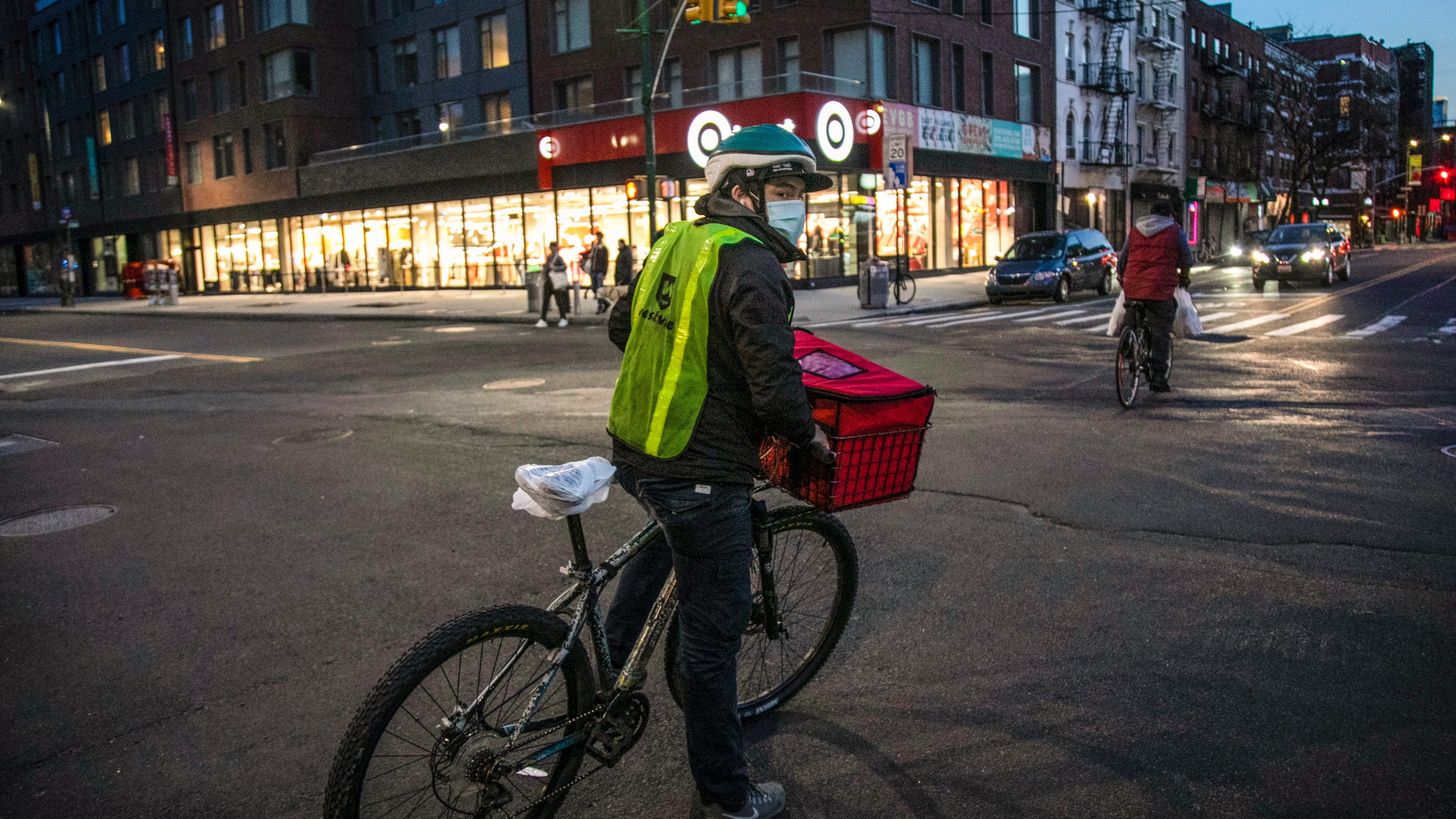 Food delivery workers, ride-share drivers demand more rights
