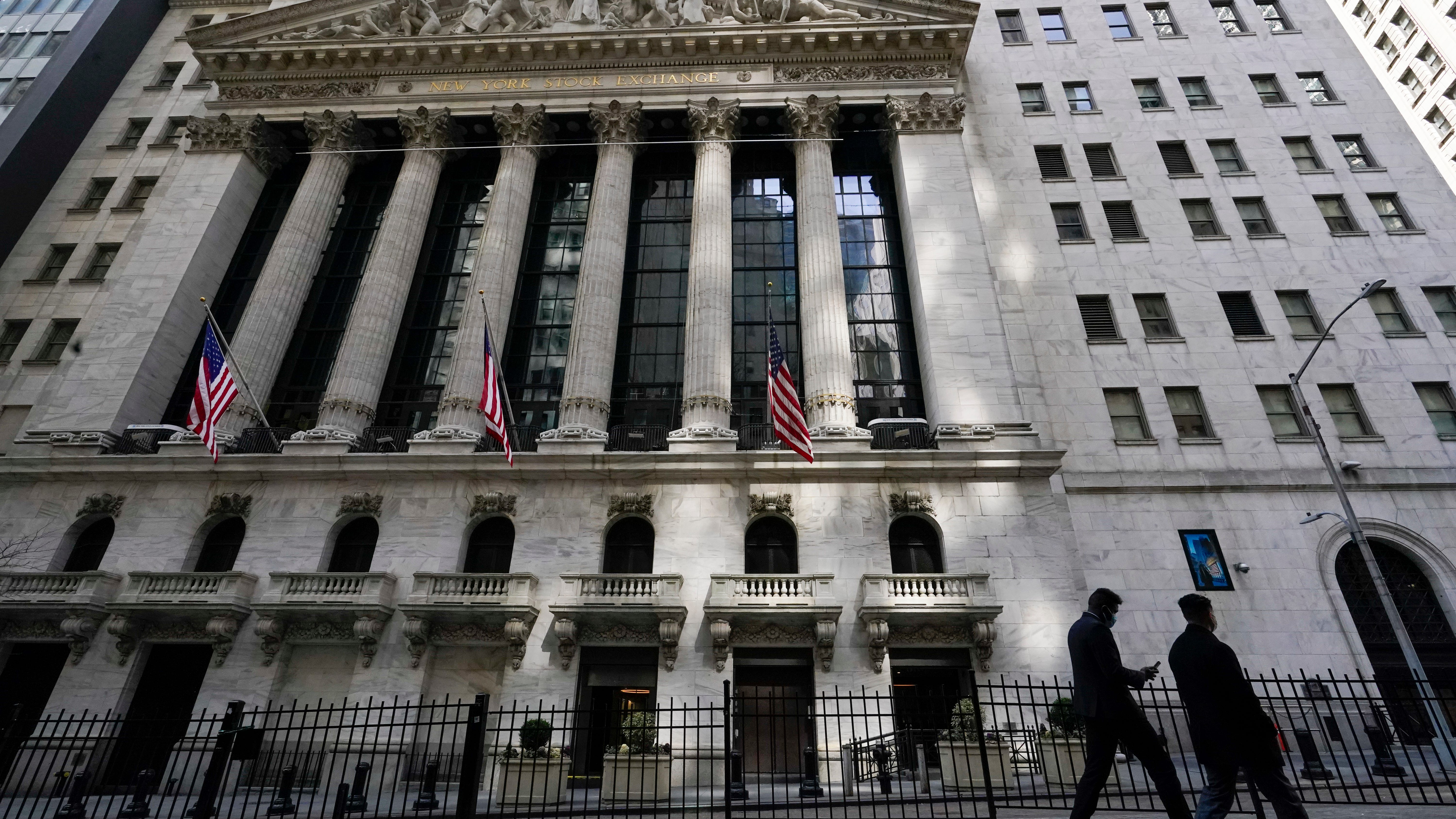 Stocks rally to records amid relief rates will remain low