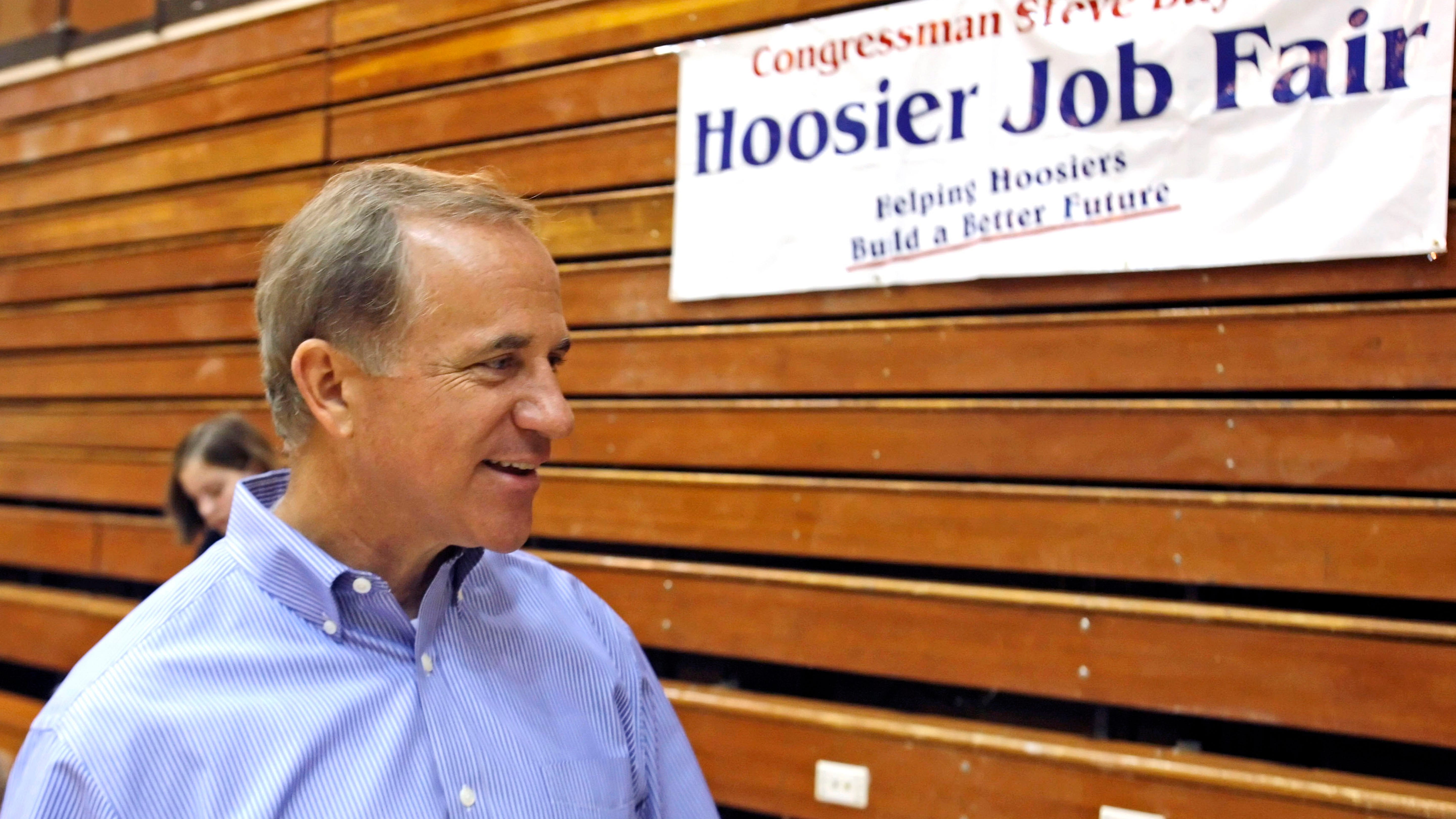 Ex-US congressman among 9 charged in insider trading cases