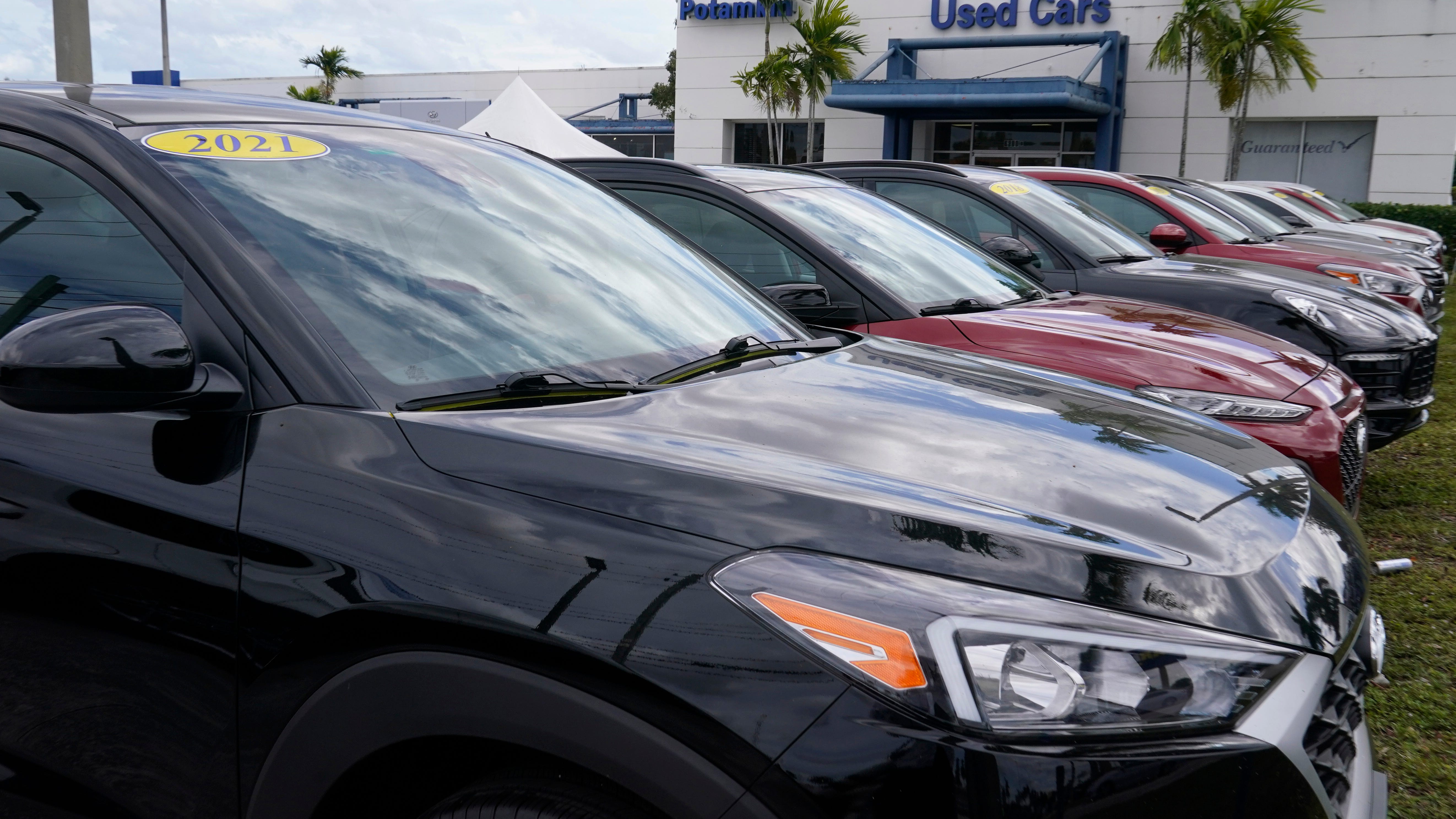 Chip shortage keeps driving up auto prices, cutting sales