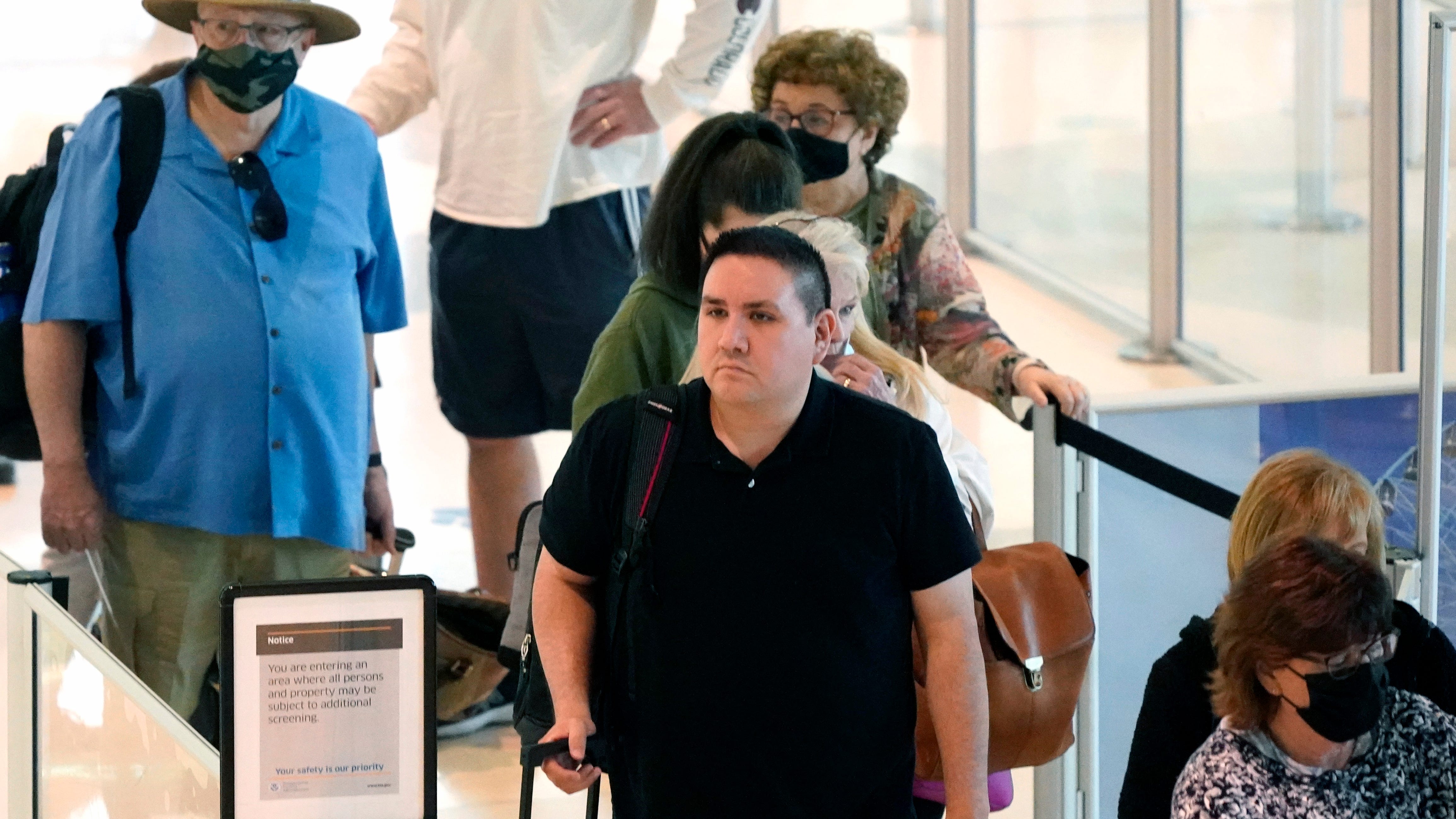 Majority of Americans want masks for travelers: AP-NORC poll