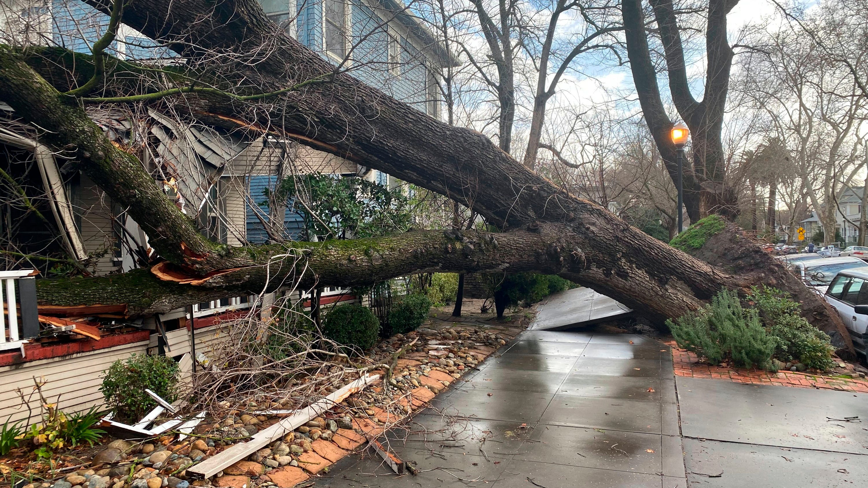 Californians cope with more rain, snow, flooding and outages
