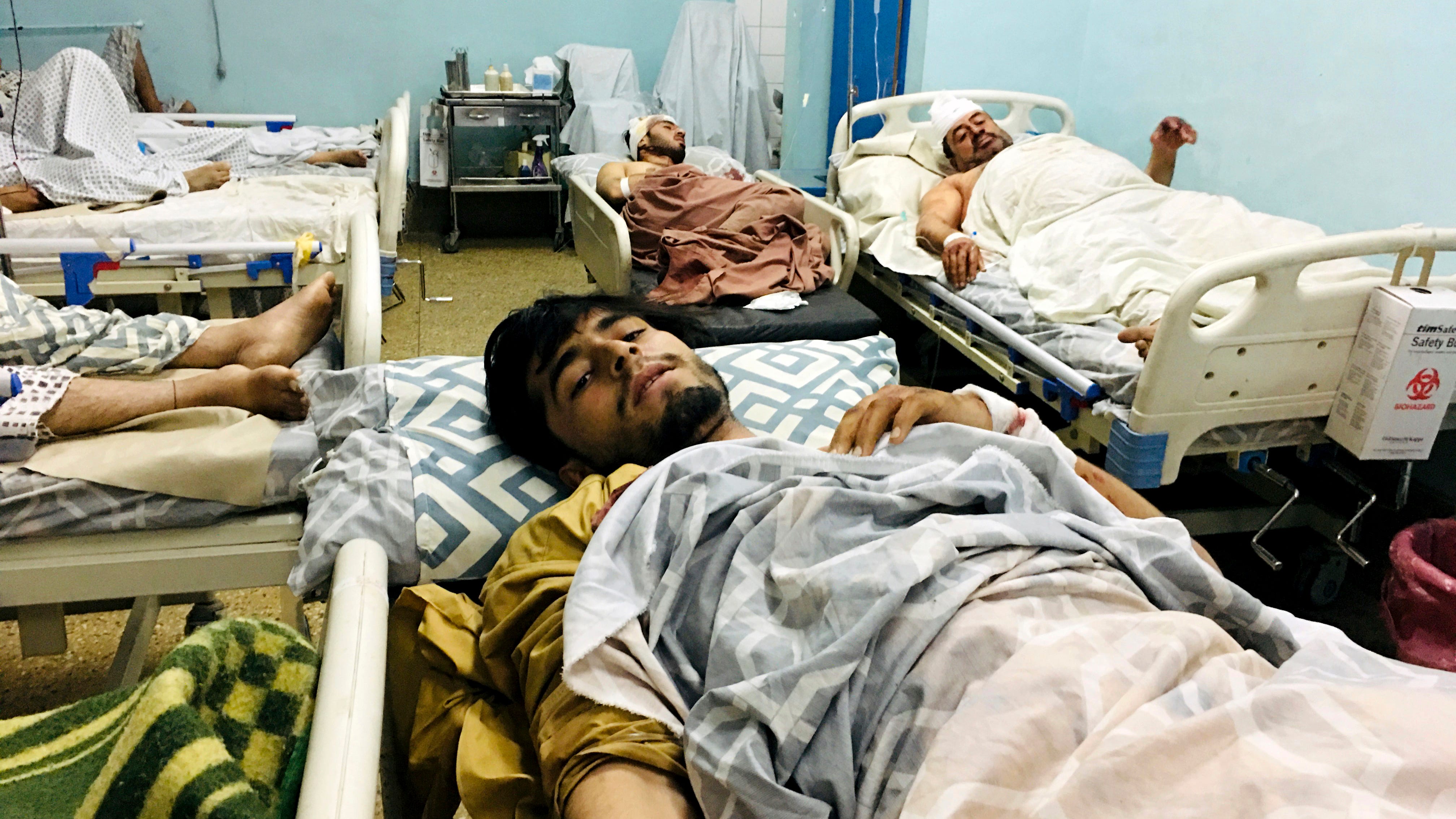 Kabul airport attack kills 60 Afghans, 13 US troops