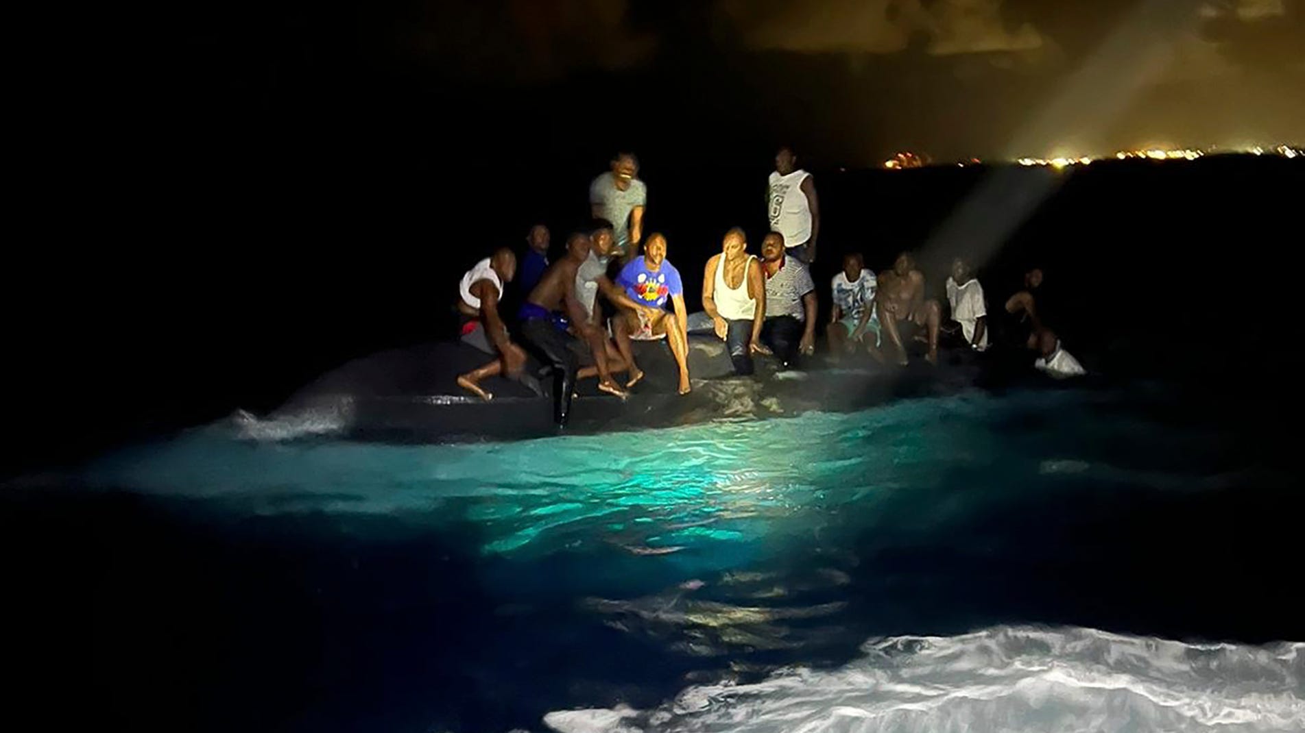 Bahamian officials search for survivors after boat sinks