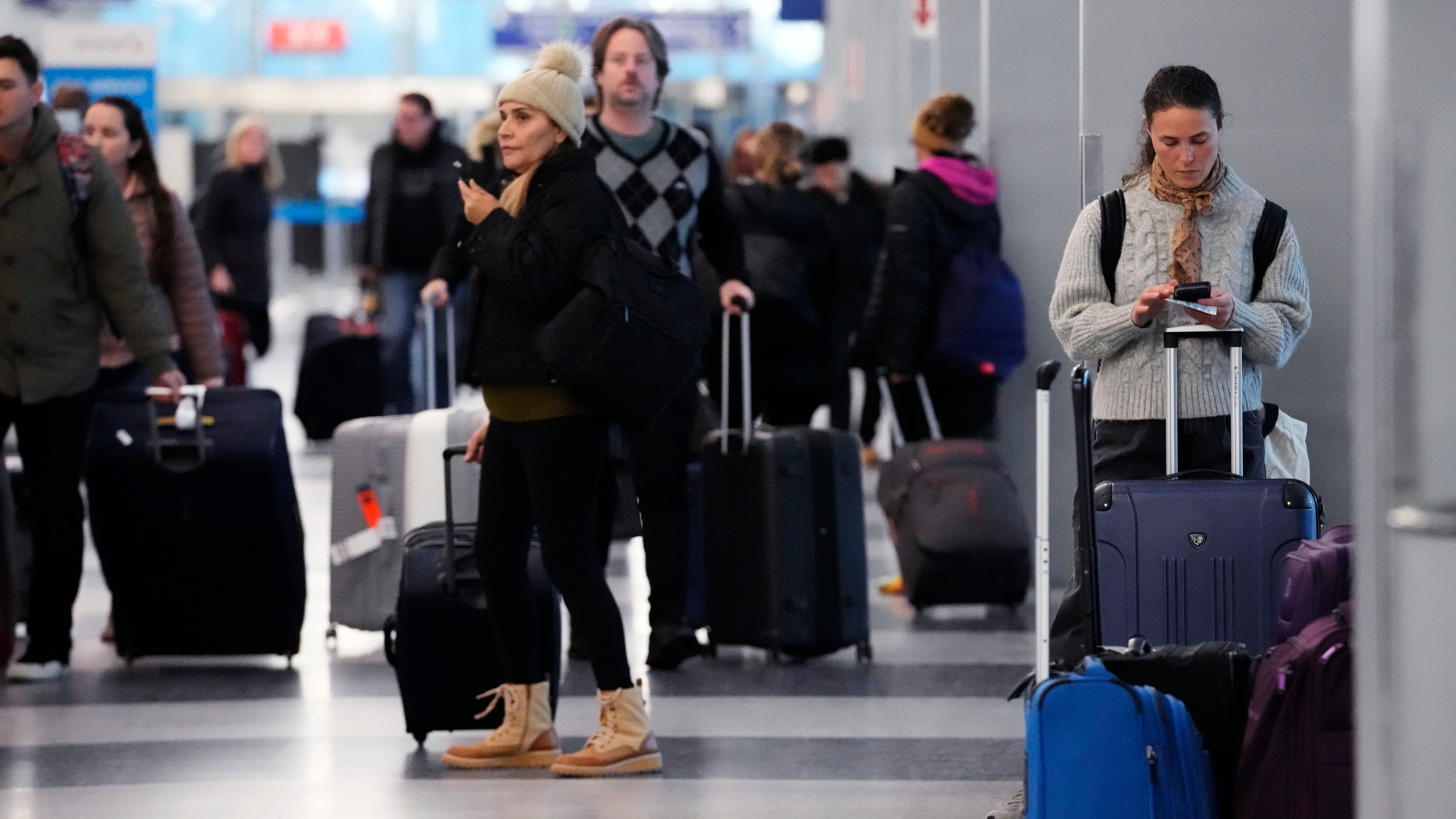 Holiday travel upended as forecasters warn of 'bomb cyclone'