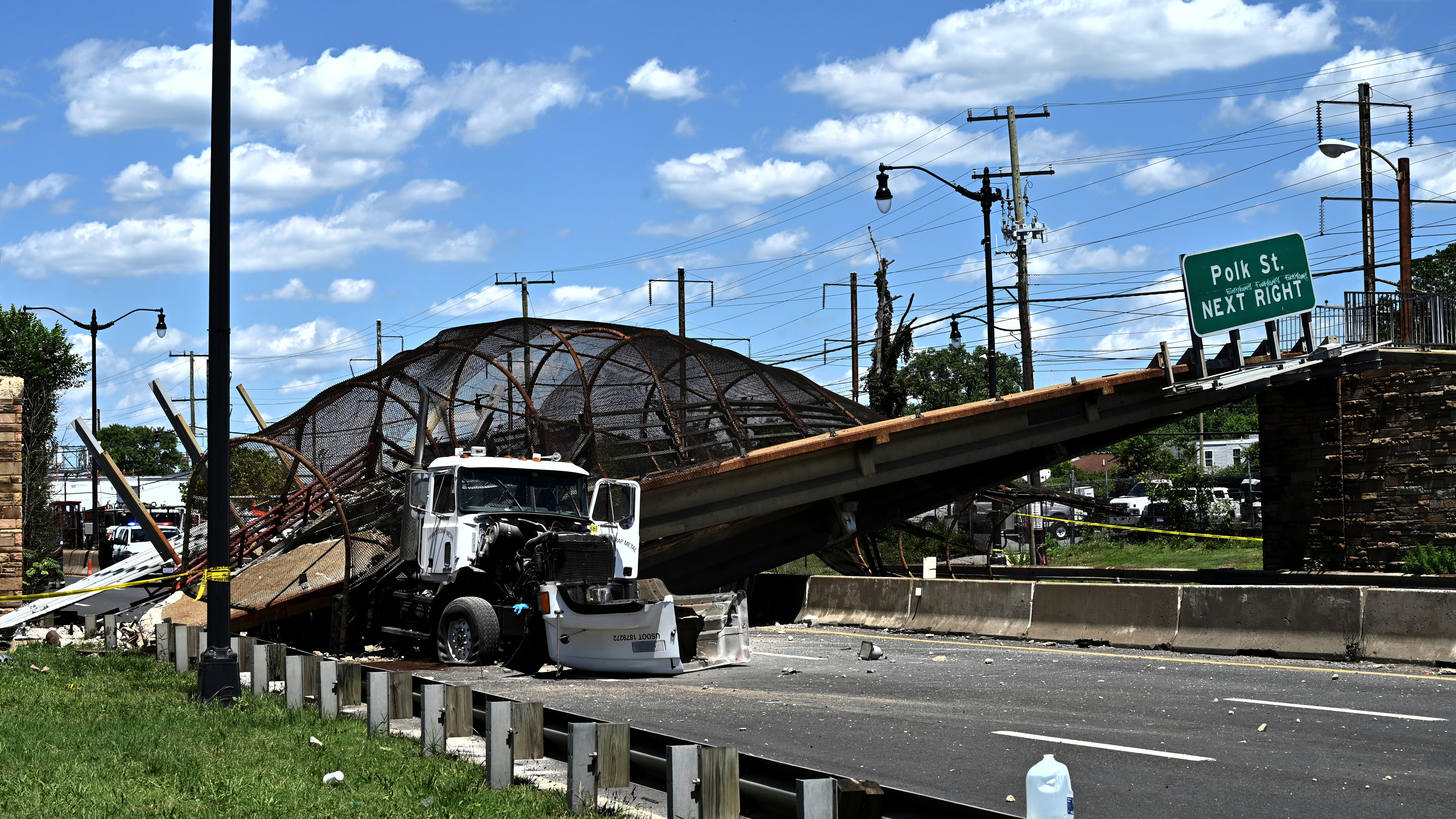 Pedestrian bridge collapses over DC highway, injuring 5