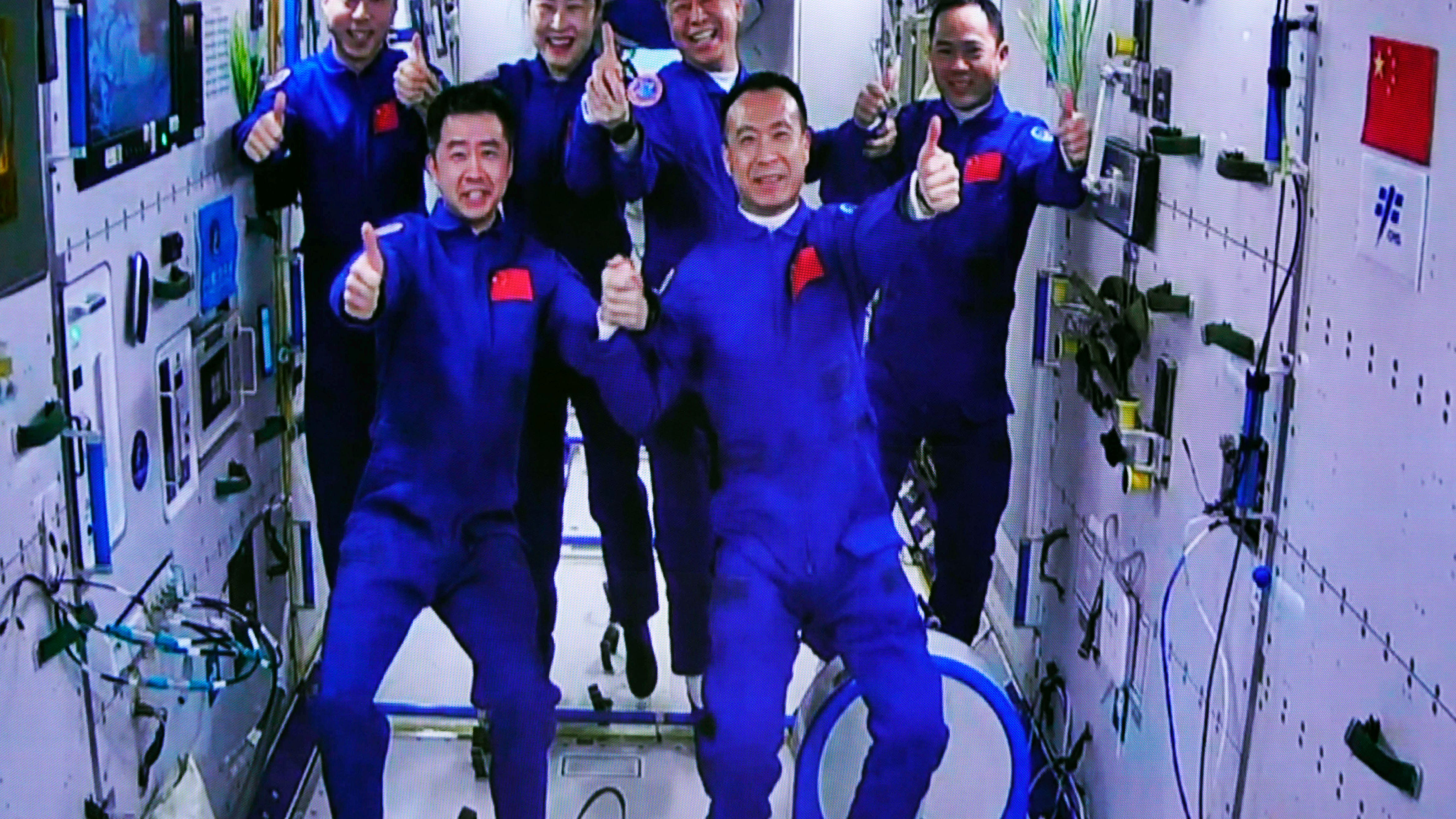 Chinese spaceship with 3 aboard docks with space station