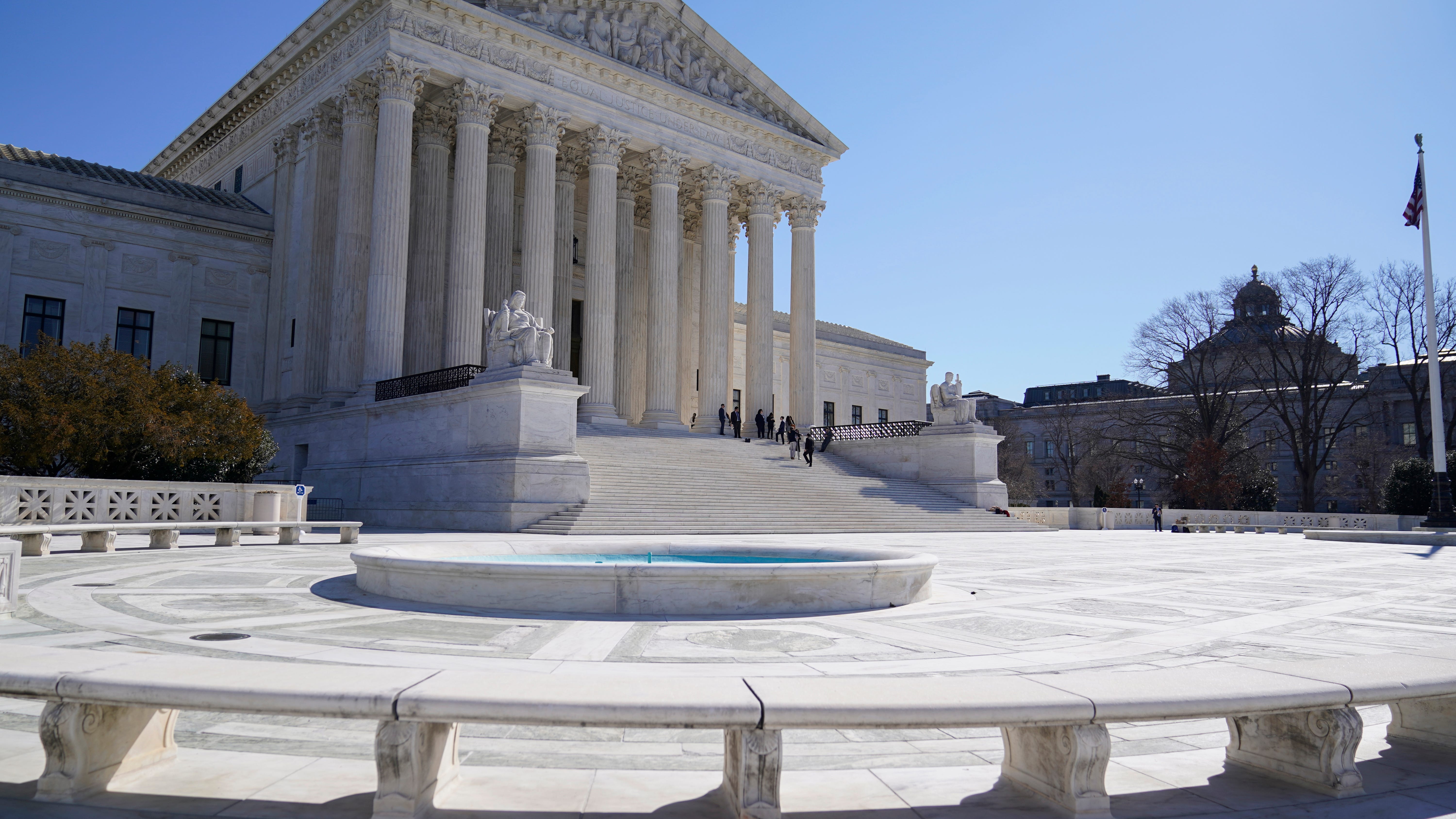 Justices dismiss Trump-era immigration case, in a Biden win