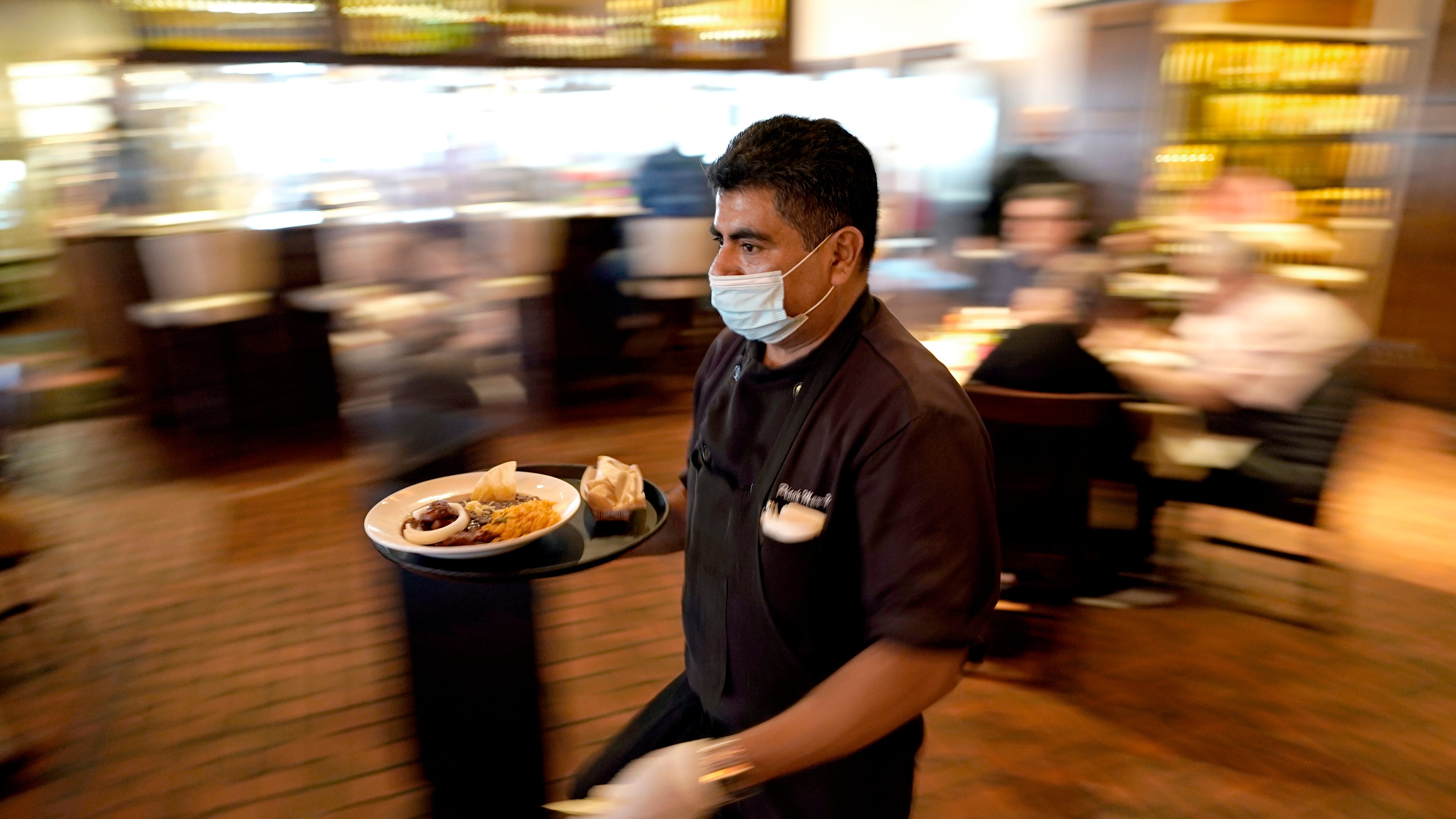 Half of US workers favor employee shot mandate: AP-NORC poll