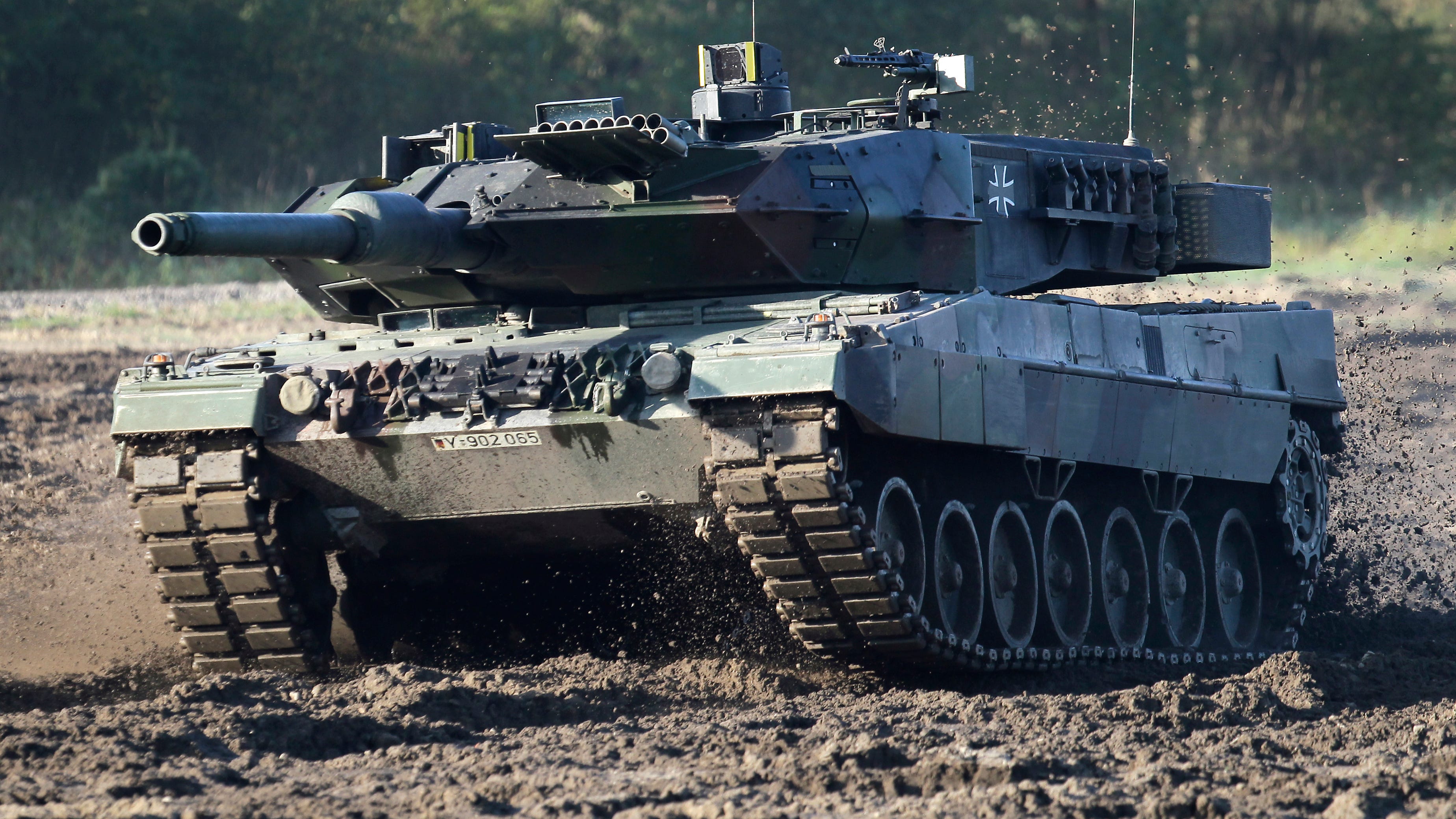 Russia plays down West's move on tanks, attacks Ukraine anew