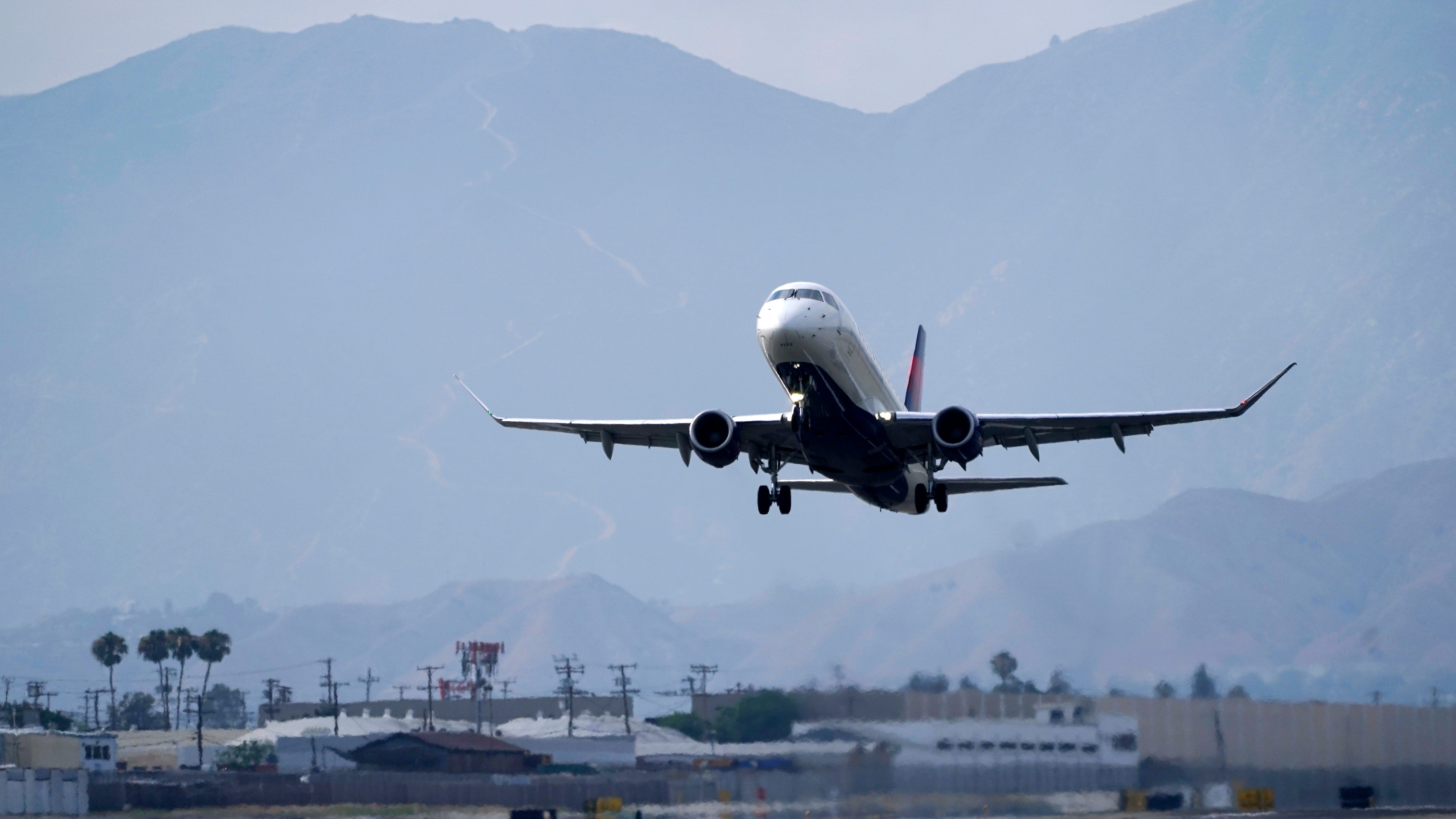 United sees more travel rebound, adds flights to warm spots