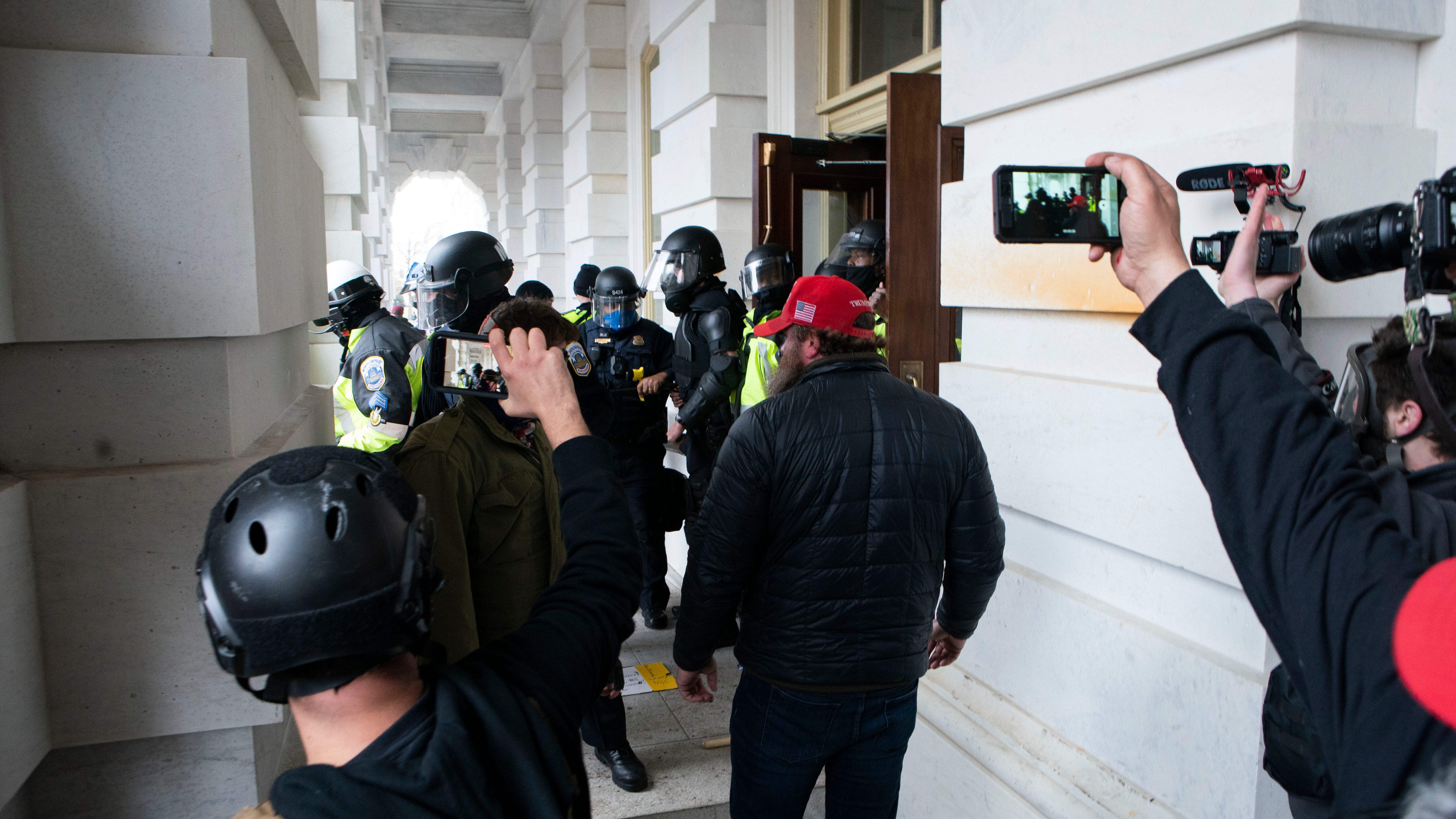 Rioters accused of erasing content from social media, phones