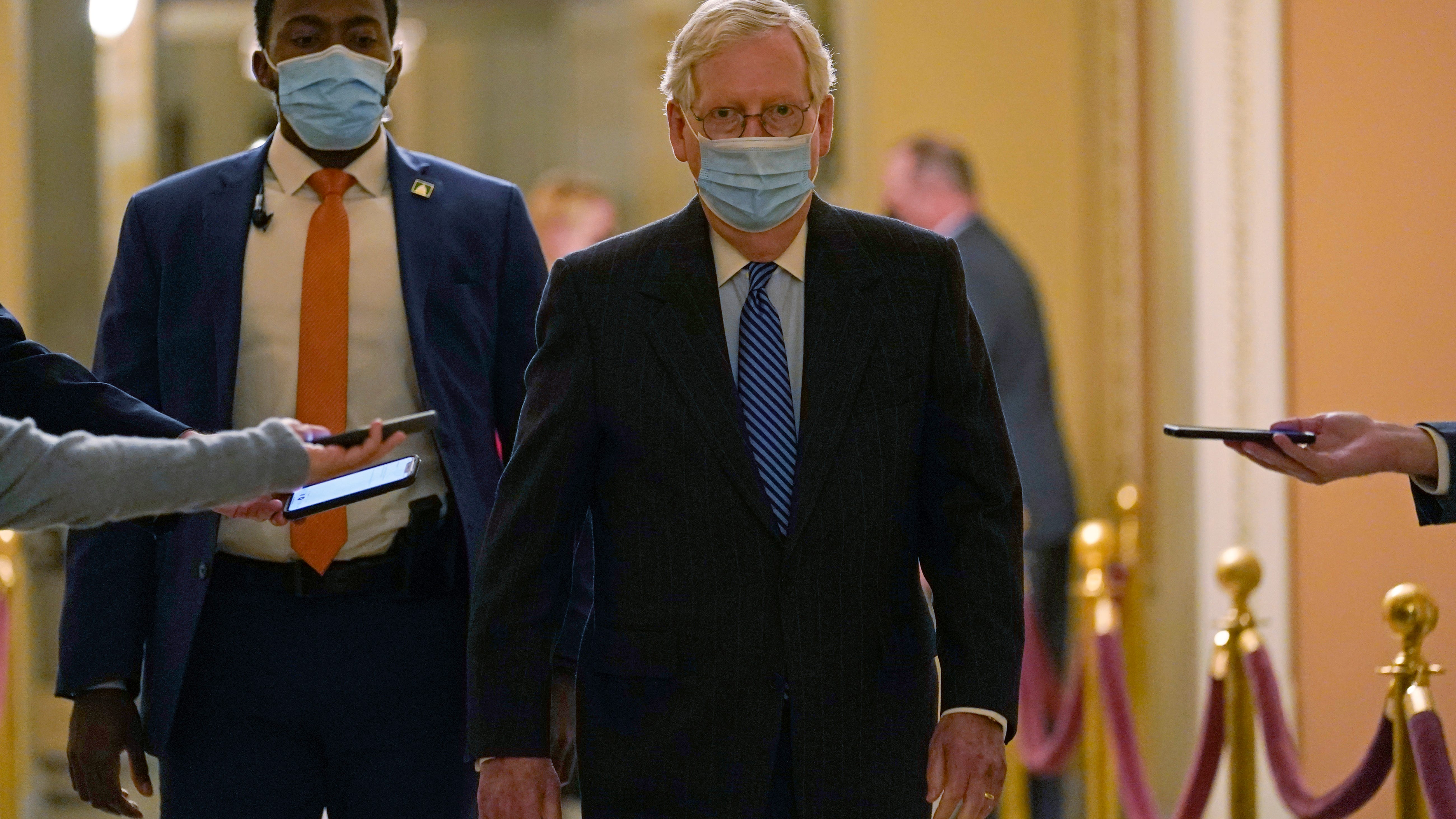 Negotiators down to a few issues on $900 billion aid plan