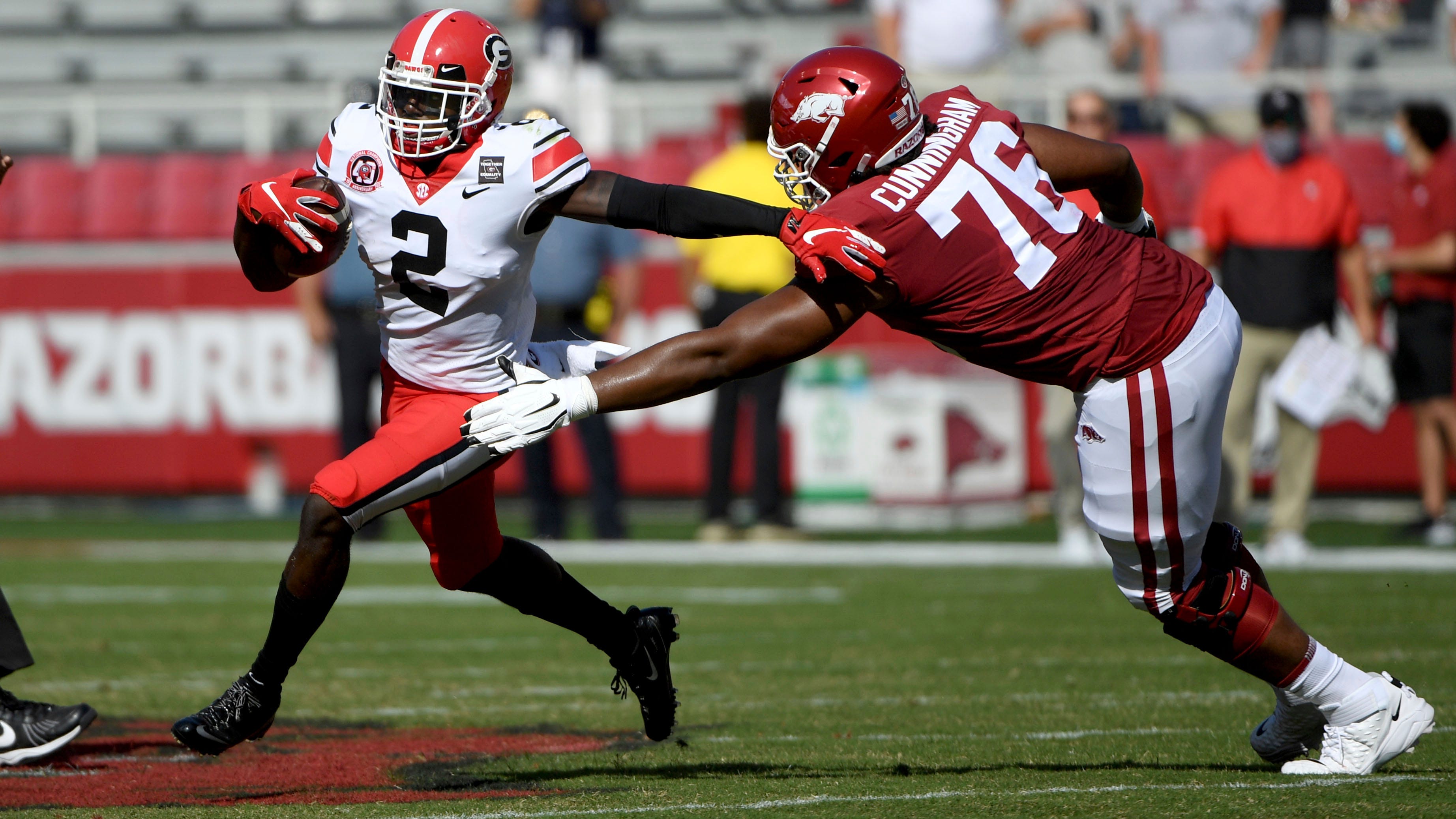 Bennett helps No. 4 Georgia rally past Arkansas 37-10